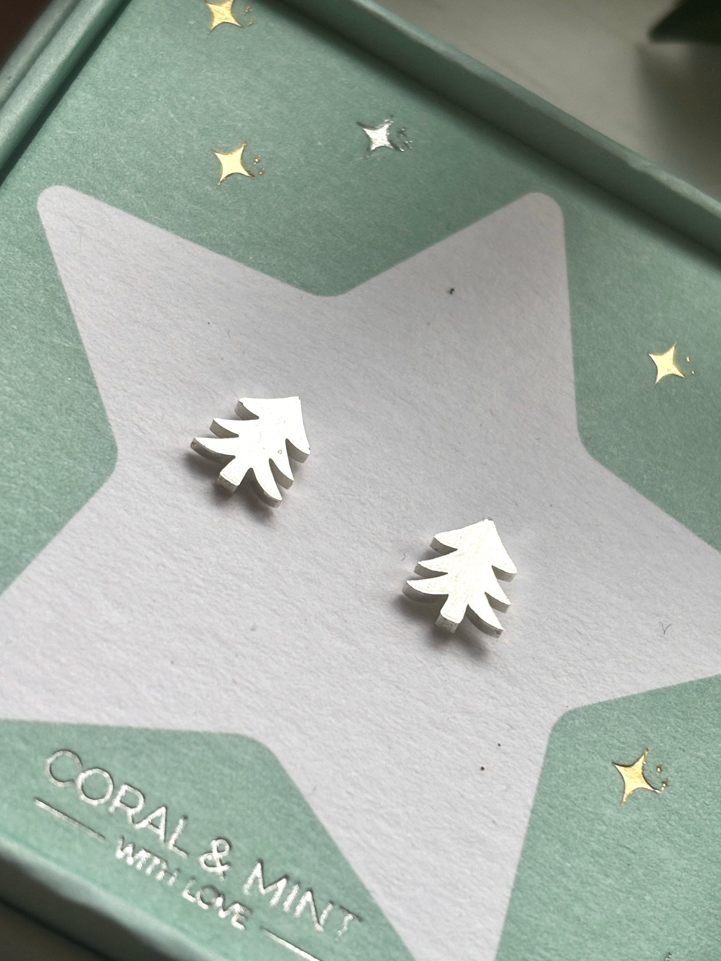 Christmas tree stud earrings—silver festive tree design on star card, perfect for holiday jewelry, gifting, and seasonal outfits