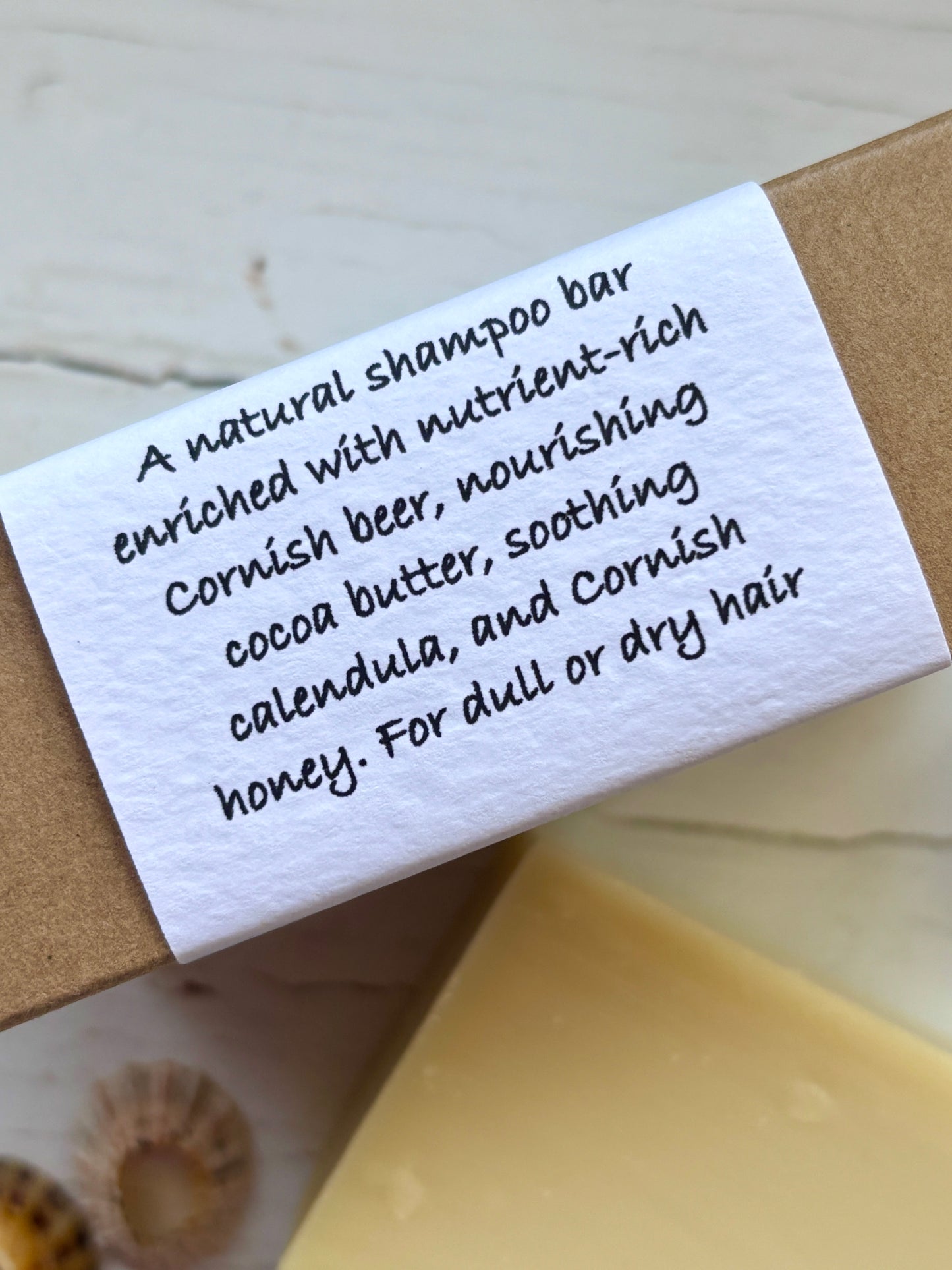 natural shampoo bar with Cornish beer, cocoa butter, calendula, and honey nourishing for dull or dry hair moisturizing formula