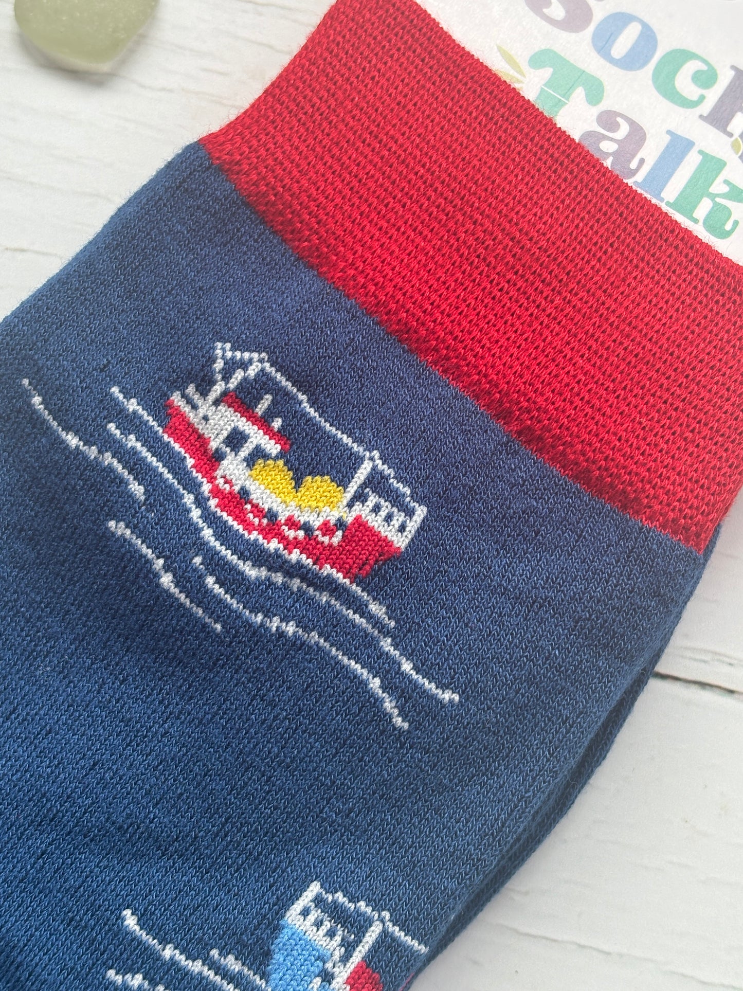 men’s nautical socks with red cuff and fishing boat design—ocean-inspired, playful style for coastal-themed casual outfits