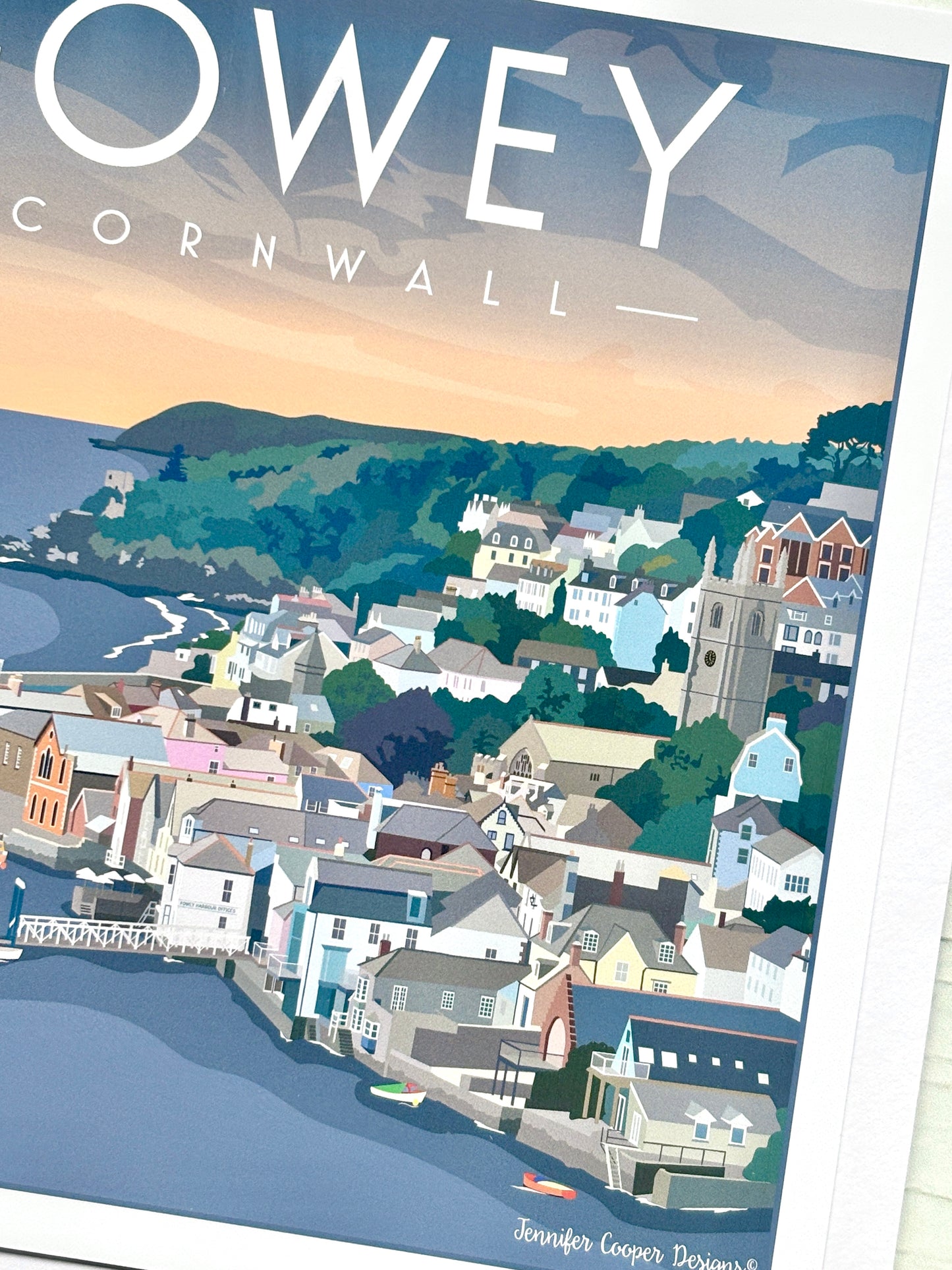 Closeup shot of fowey Cornwall art print showing coastal town, boats, and sunset, seaside illustration postcard by Jennifer Cooper Designs
