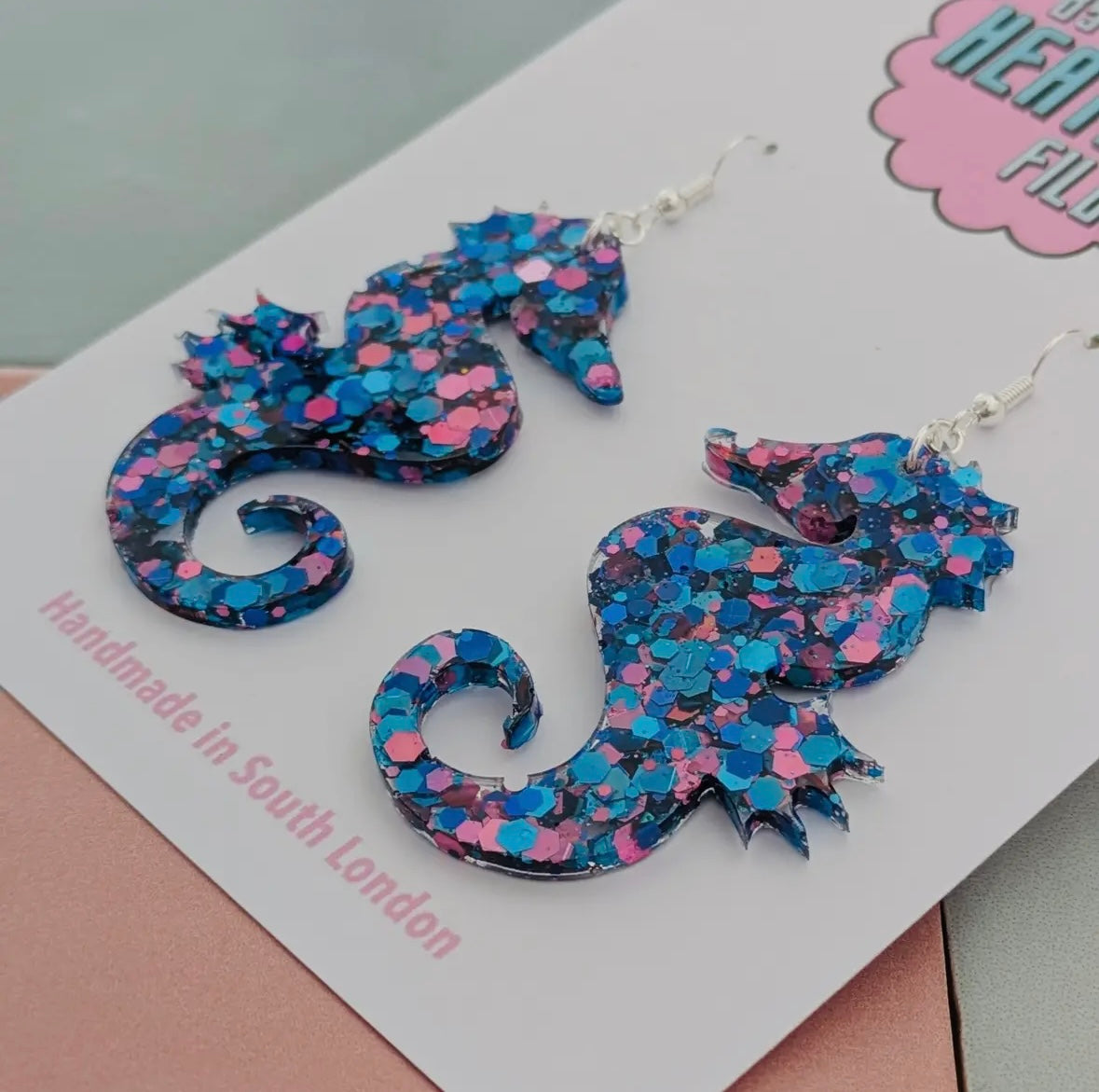 glitter seahorse dangly earrings—handmade ocean-inspired studs with pink, blue, and purple sparkle for bold summer styling