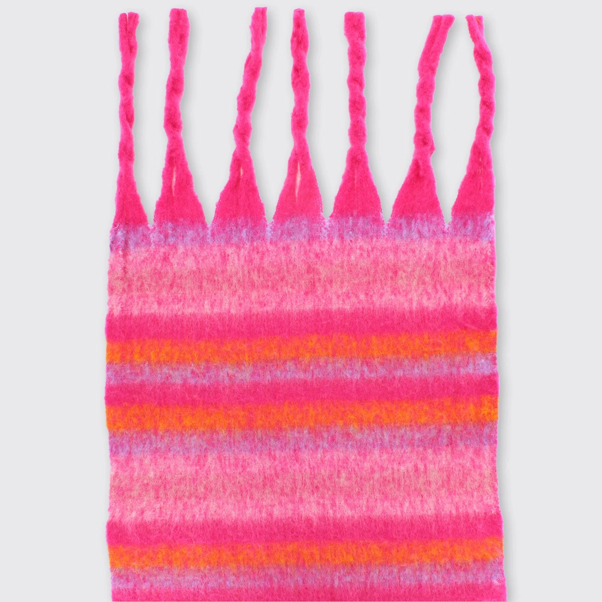 pink orange striped scarf detail - soft knit texture with long fringe tassels colorful ombre pattern closeup