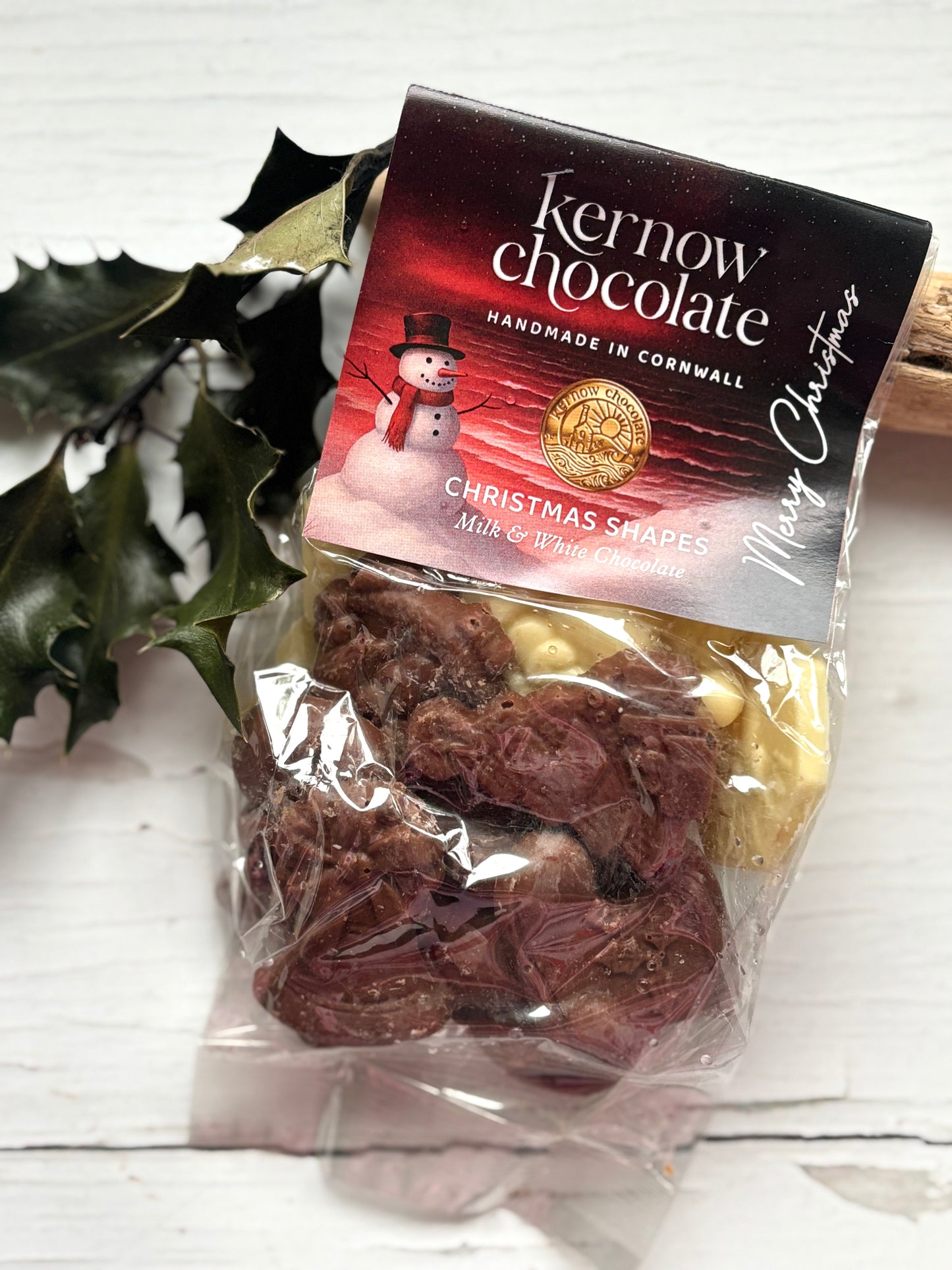festive Kernow Christmas chocolates in milk & white, handmade in Cornwall with holiday-themed packaging