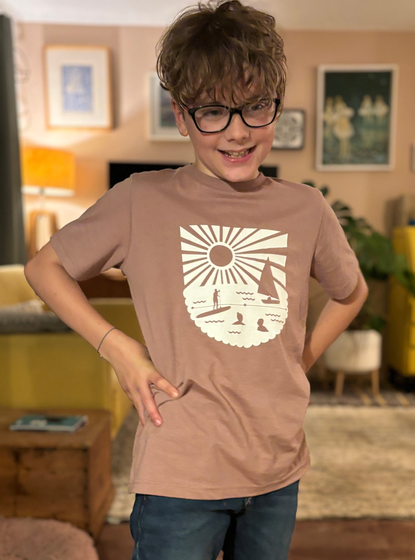 sage green kids’ tee with Readymoney Cove beach print—easygoing, soft, and perfect for laid-back coastal days