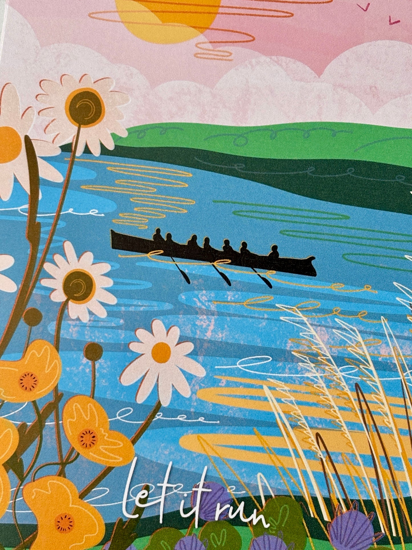closeup shot of gig rowing card - team rowing boat, pink sky, blue water, daisies, buttercups art by Tula and the Whale