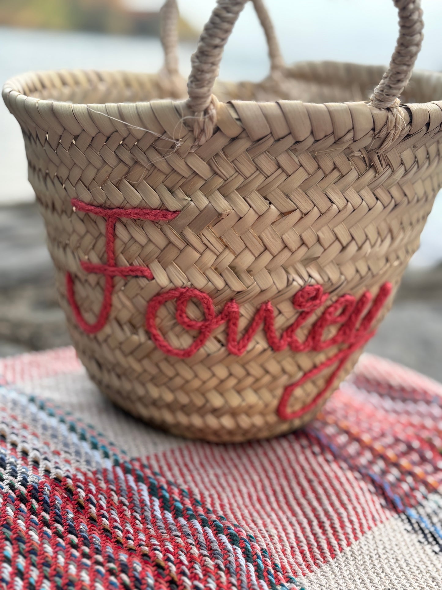 limited edition 'Fowey' mini straw basket hand-embroidered red yarn, festive, coastal tote bag, perfect for beach/holiday