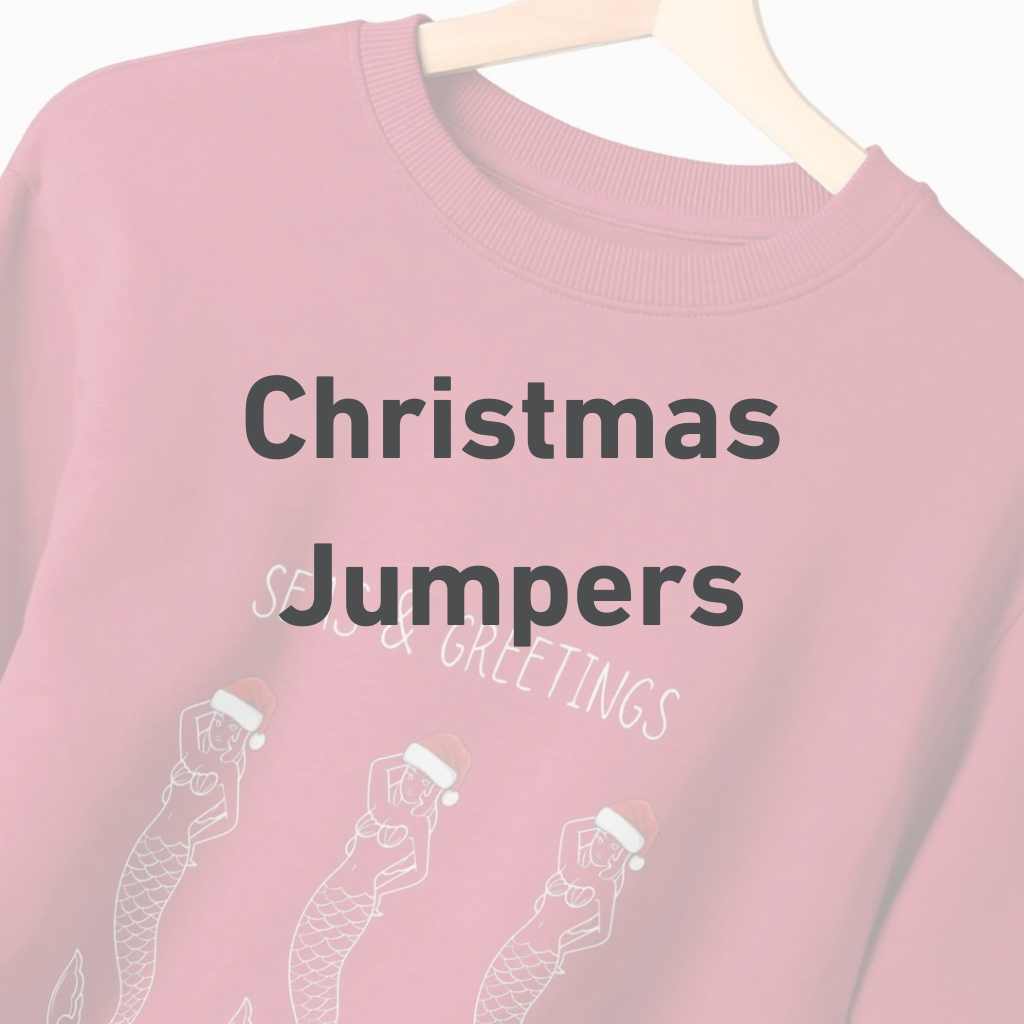 THE WORDS CHRISTMAS JUMPERS OVER A RED READYMONEY MERMAIDS CHRISTMAS JUMPER