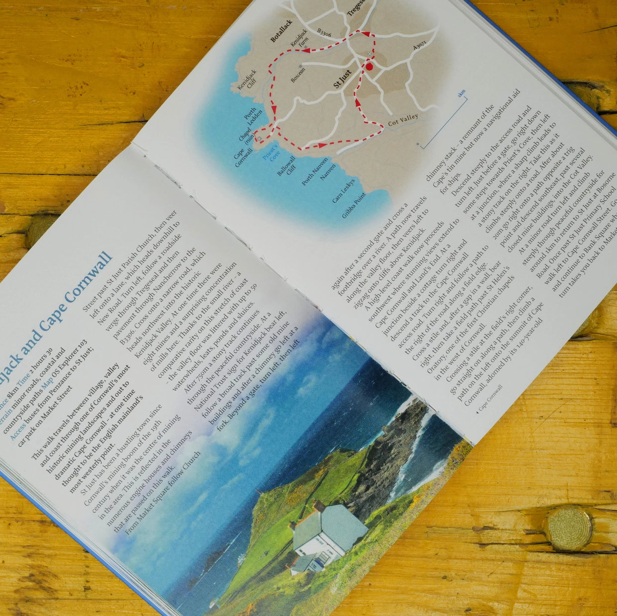 Cornwall walking guide inside pages showing St Just Cape Cornwall route map, coastal photography, detailed trail info