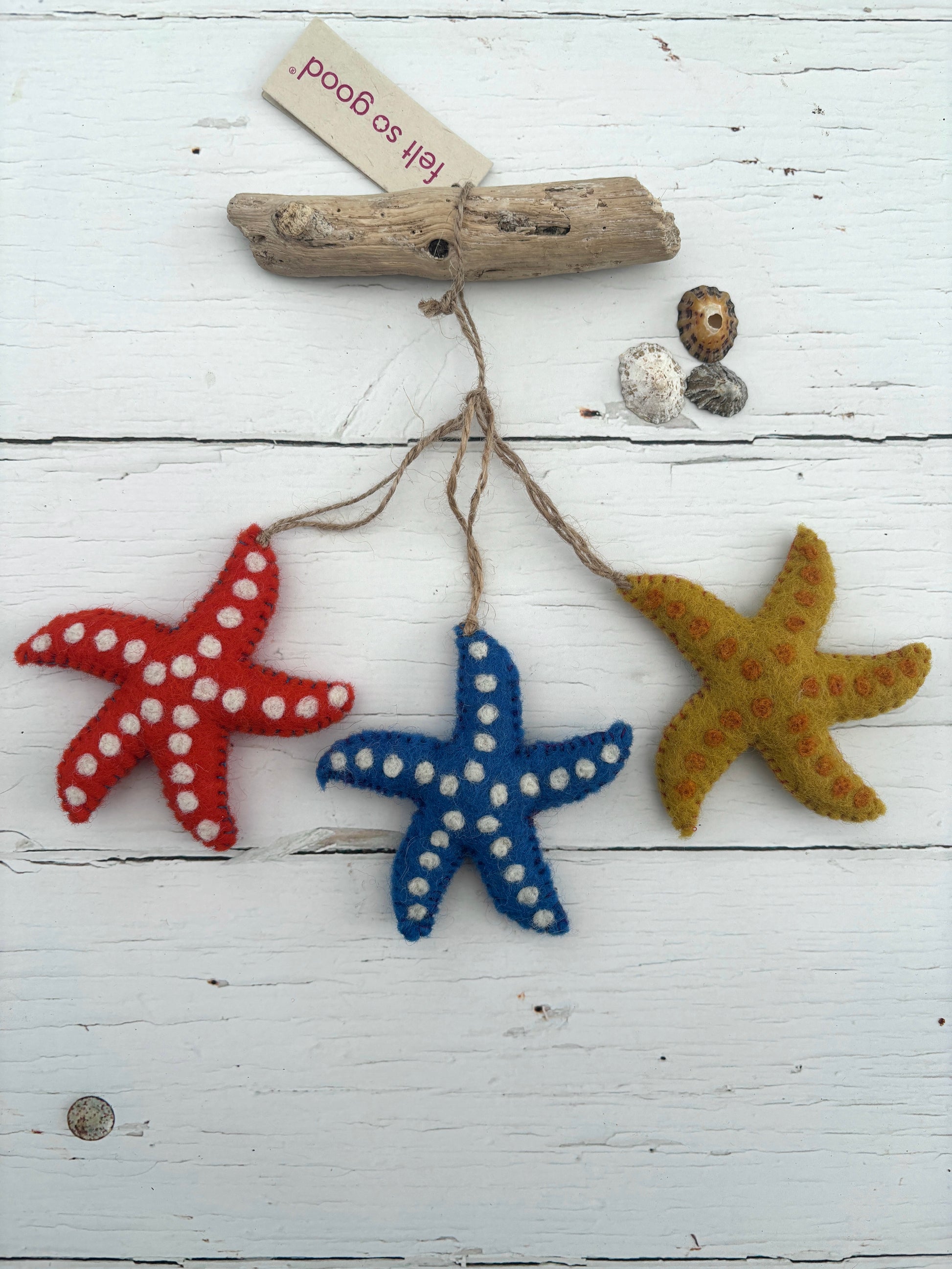 three felt starfish decorations