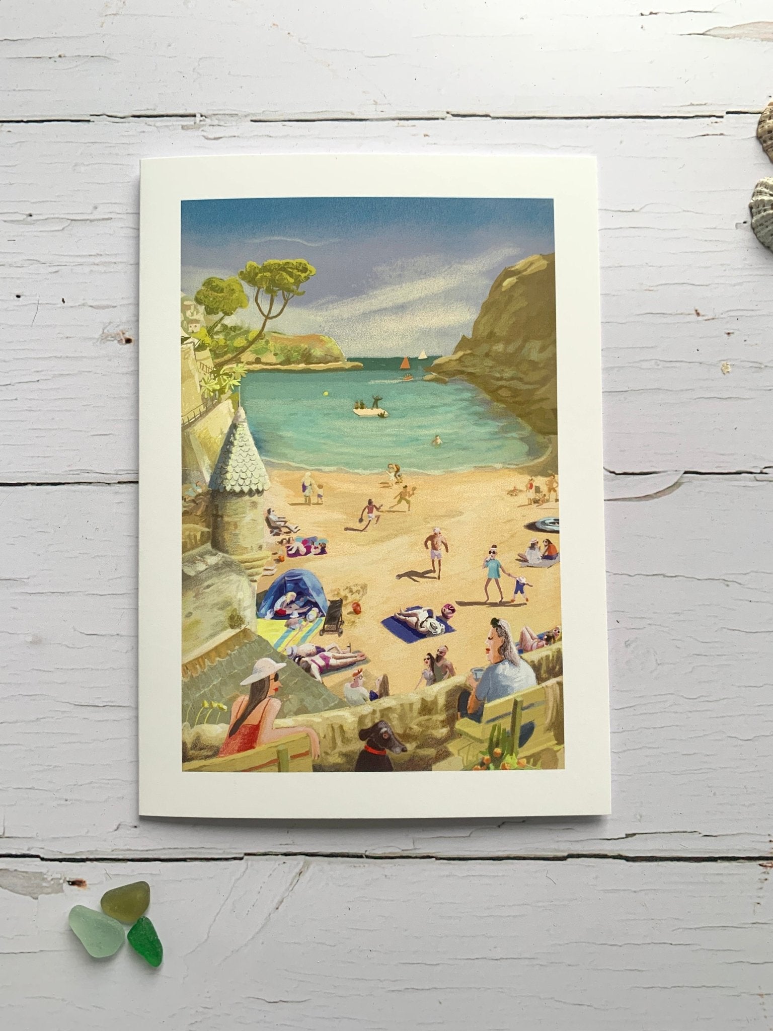 Readymoney beach Cornwall greeting card, retro-style seaside illustration with sunbathers, swimmers, turquoise cove