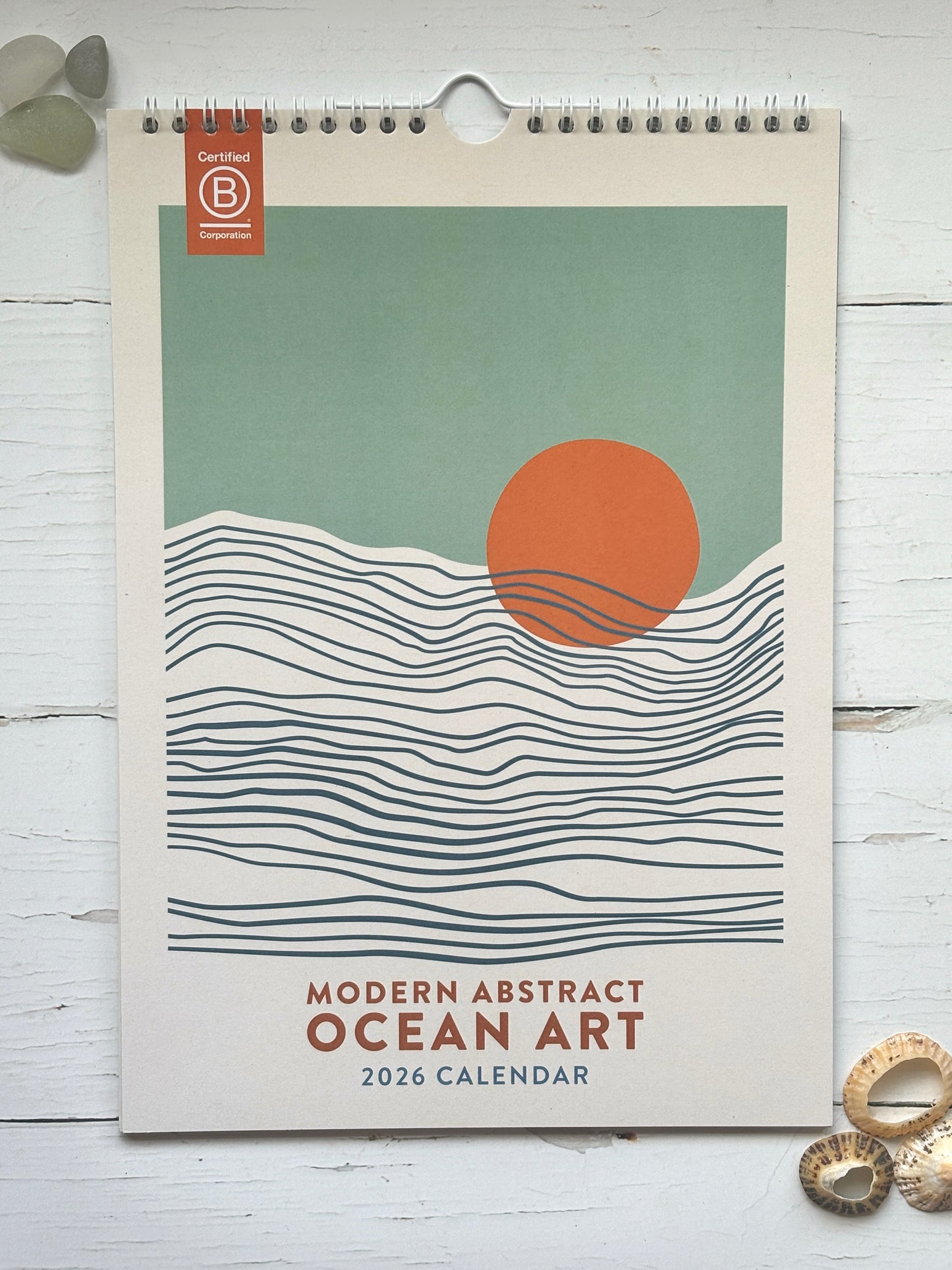 modern abstract ocean art 2026 calendar—stylized wave and sun cover, perfect for coastal-inspired planning, décor, and gifting