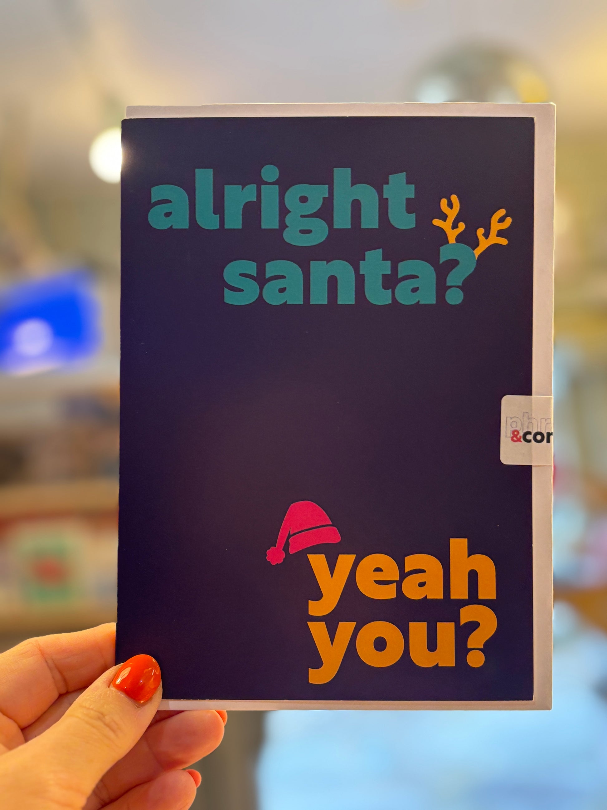 Cornish slang Christmas card "Alright Santa? Yeah You?" humorous holiday greeting with Santa hat, modern typography