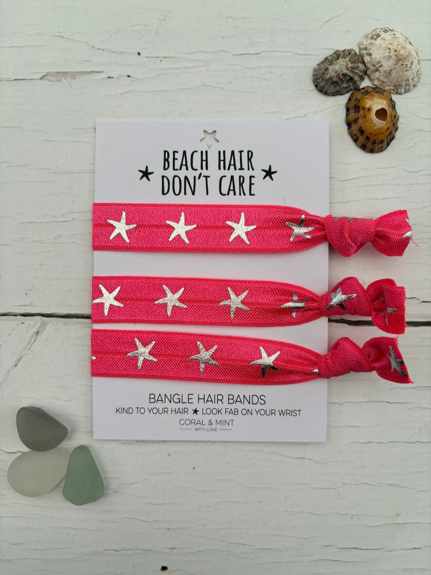 hot pink star hair ties—beachy bangle bands that style your hair and wrist with bold coastal flair