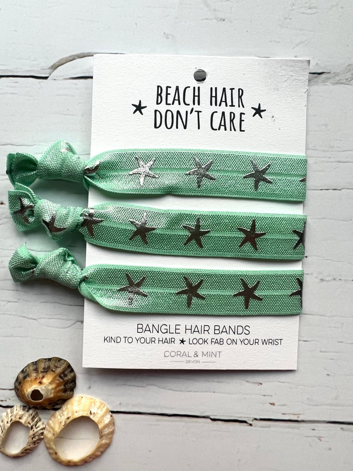 mint green star hair ties—beachy bangle bands that are gentle on hair and stylish on your wrist