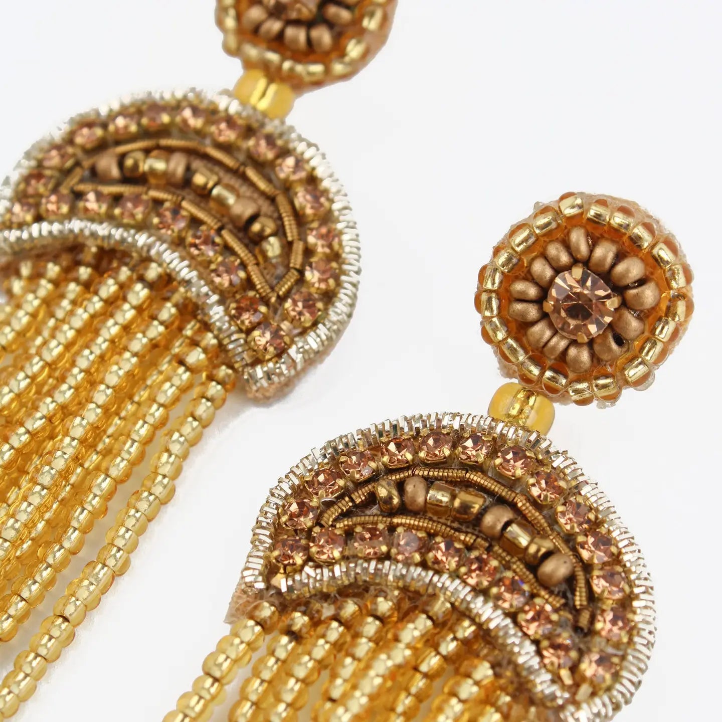 beaded gold jellyfish earrings on a white background
