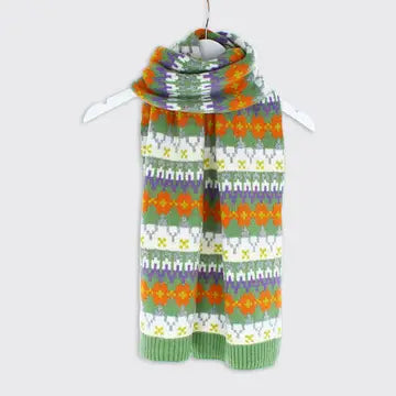 green fair Isle knit scarf - orange yellow geometric floral stripe pattern with white daisy & zigzag details