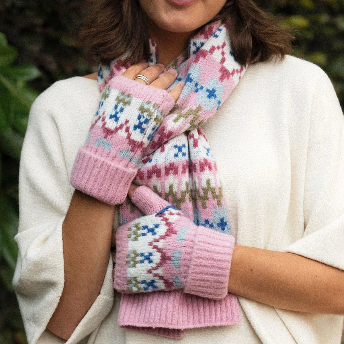 pink fair isle fingerless gloves - geometric stripe pattern knit hand warmers with blue green white zigzag detail