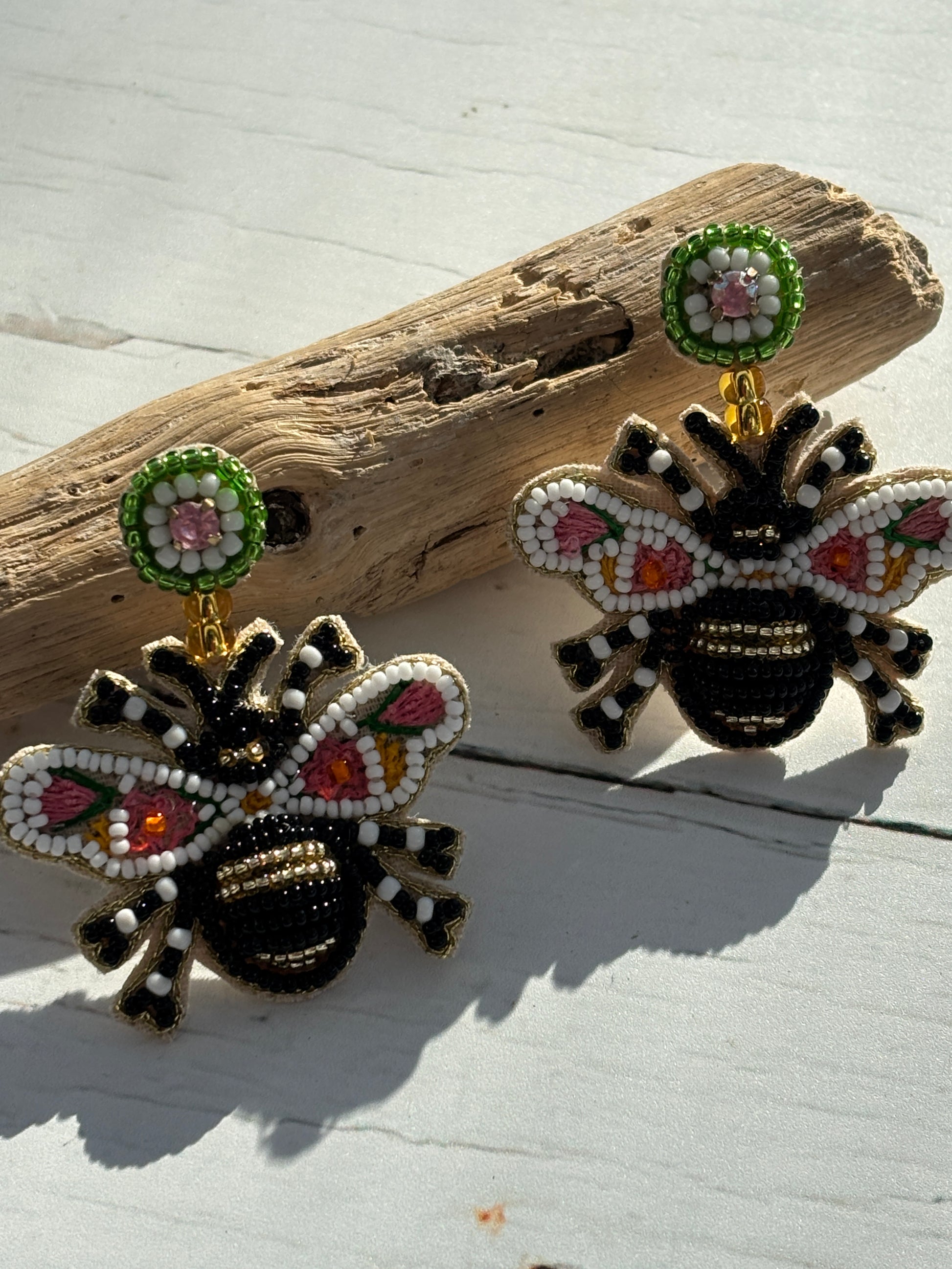 hand-beaded bee earrings with floral wings—bold nature-inspired accessories for statement summer style