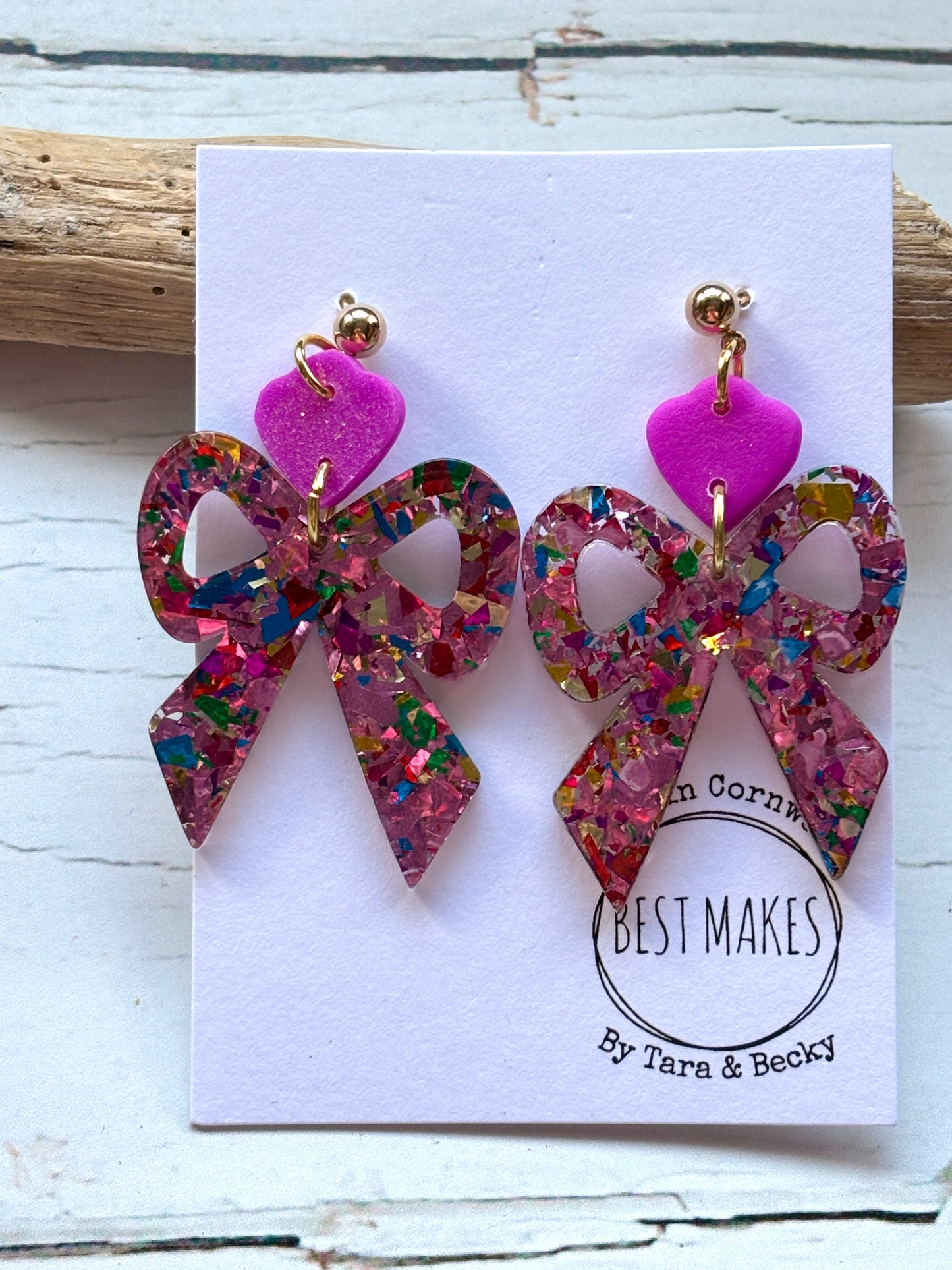 glitter bow earrings handmade sparkly pink polymer resin with confetti flecks statement party jewelry and fun fashion gift