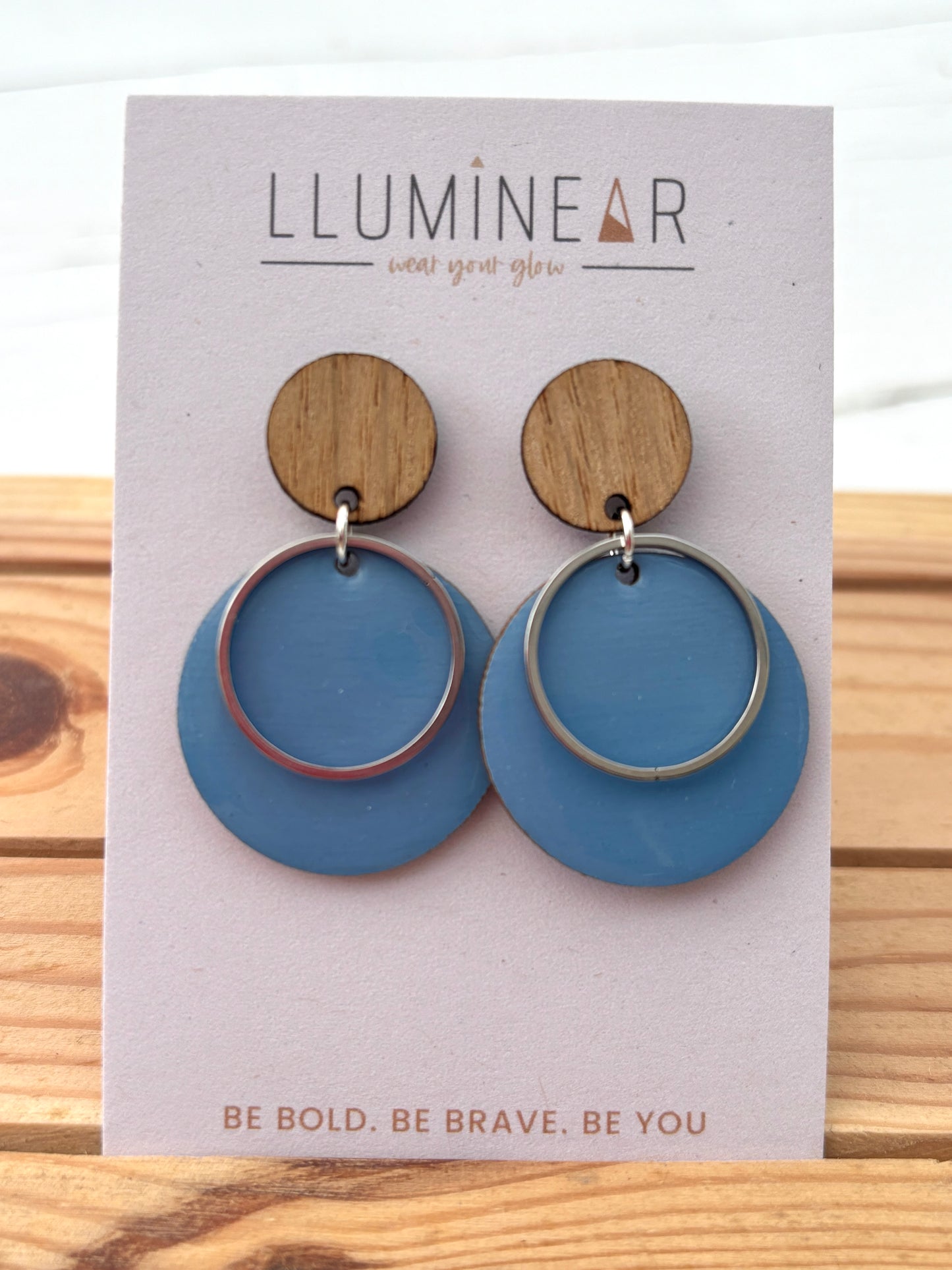 bold blue disc earrings with wood accents and metal rings; handcrafted statement jewelry for everyday wear