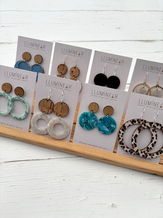 bold dangly earrings with wood tops and vibrant prints; handcrafted statement jewelry for everyday wear