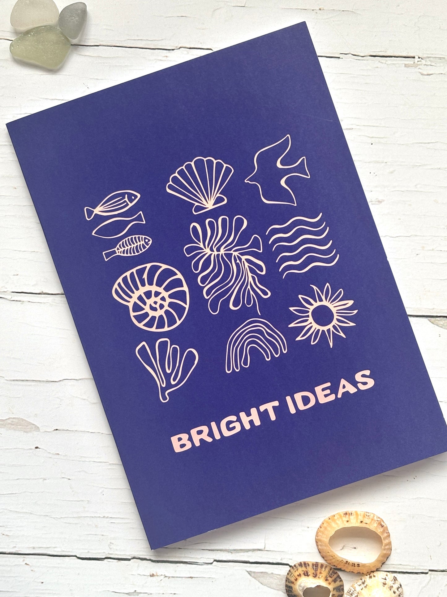 “Bright Ideas” coastal notebook in navy—sea-themed icons on recycled cover, perfect for eco-friendly journaling and gifting