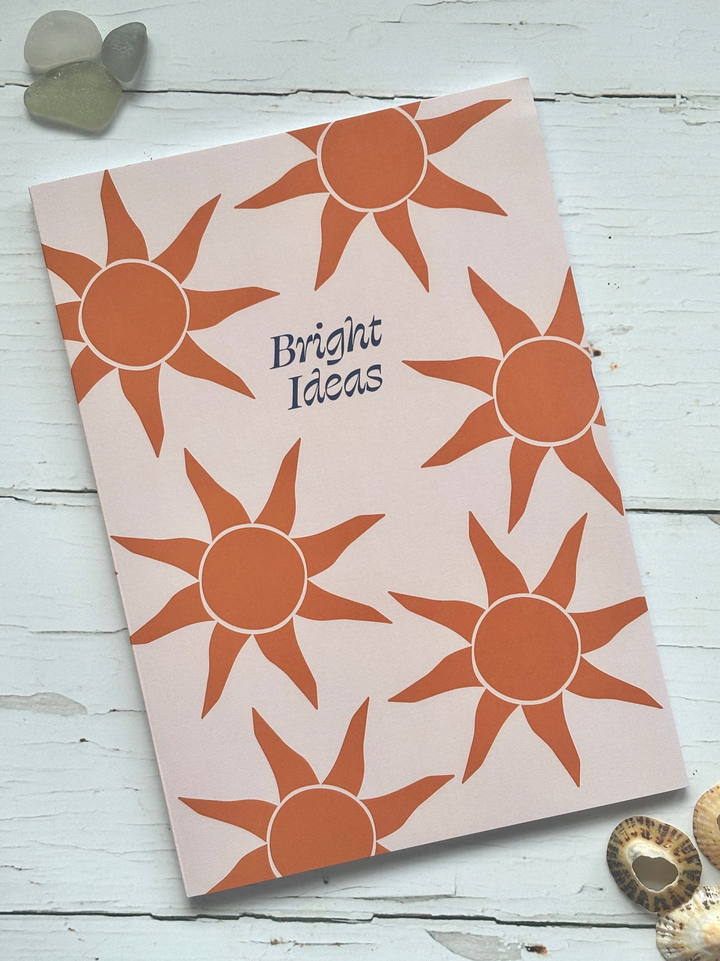 “Bright Ideas” sunshine notebook with bold orange sun pattern—cheerful, creative journal for writers, dreamers, and gift-givers
