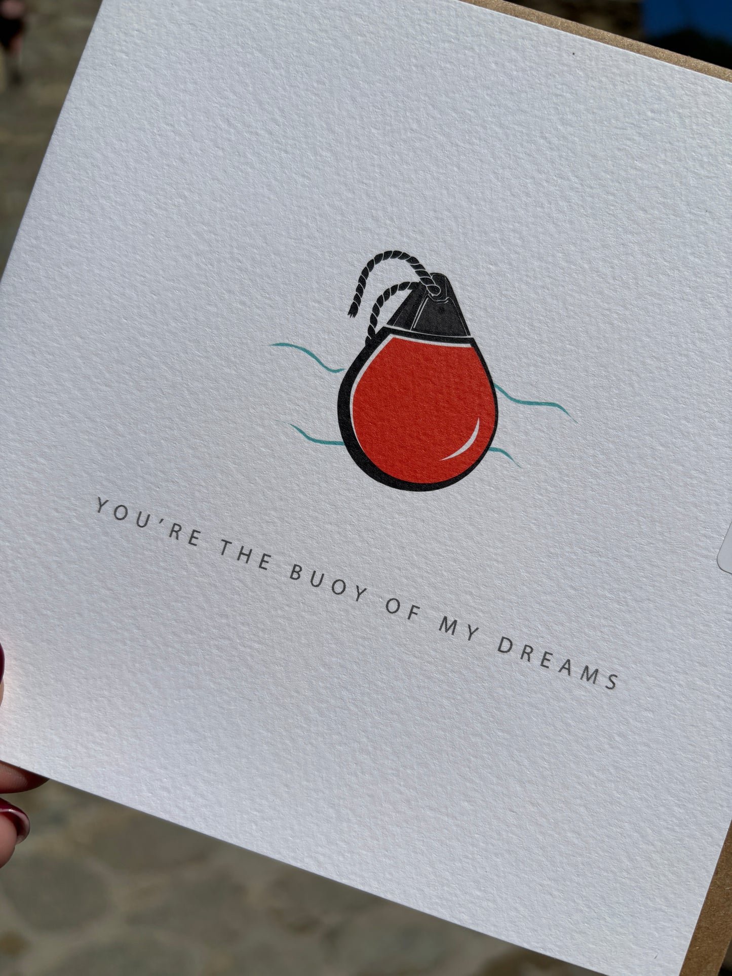 closeup shot of of romantic square card art: Red buoy illustration with sea waves simple nautical love pun stationery