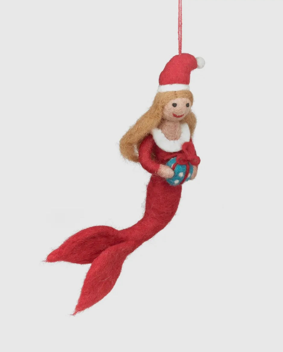 side view shot of handmade felt mermaid Christmas ornament needle-felted coastal fairy tale decor red Santa outfit and tail