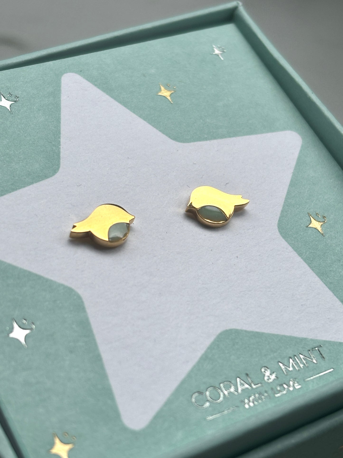 Christmas Robin stud earrings—gold bird design on festive gift card, perfect for holiday jewelry, stocking fillers, and gifting