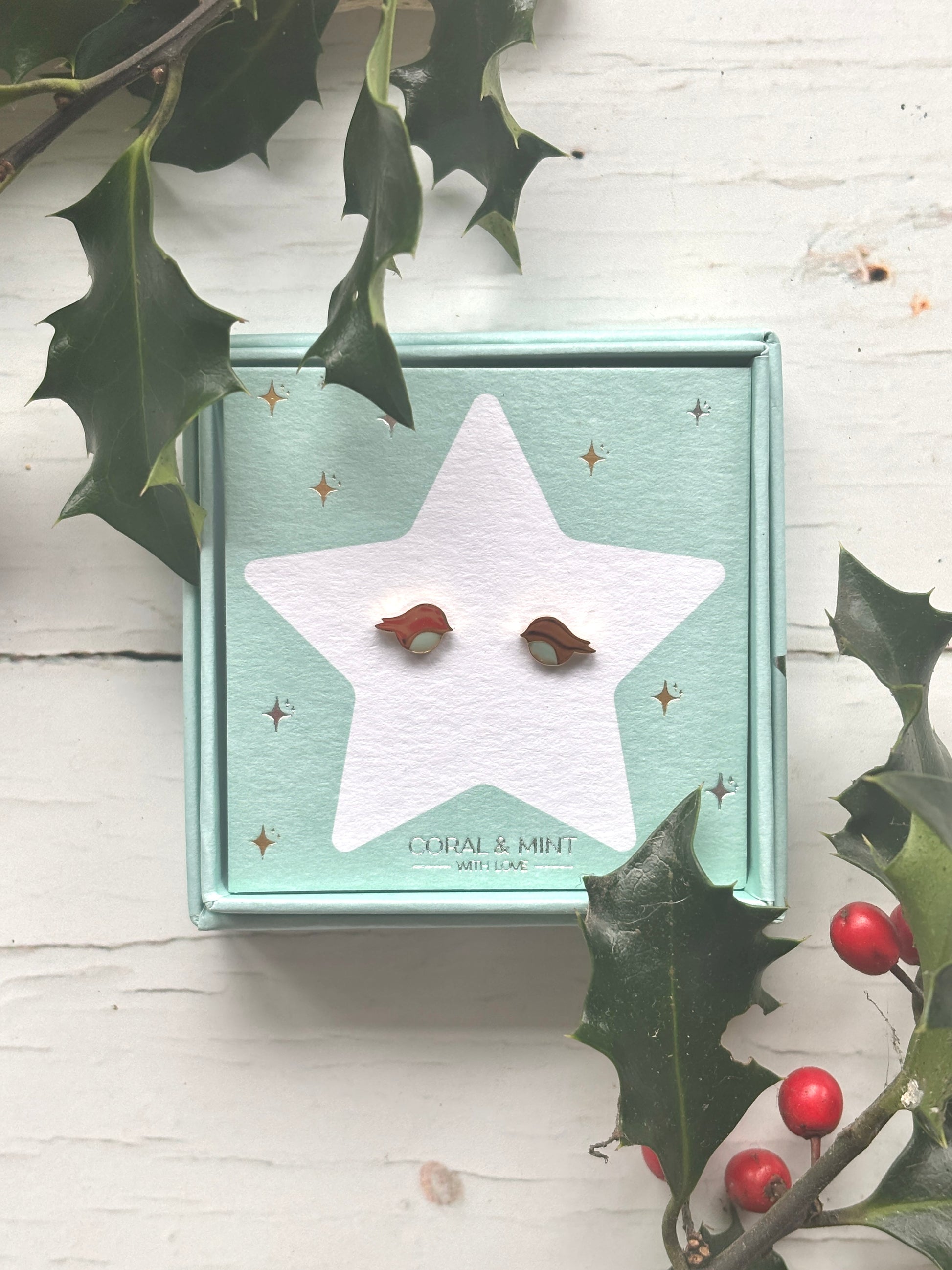 Christmas Robin stud earrings—festive bird design on star card with holly accents, perfect for holiday jewelry and seasonal gifting