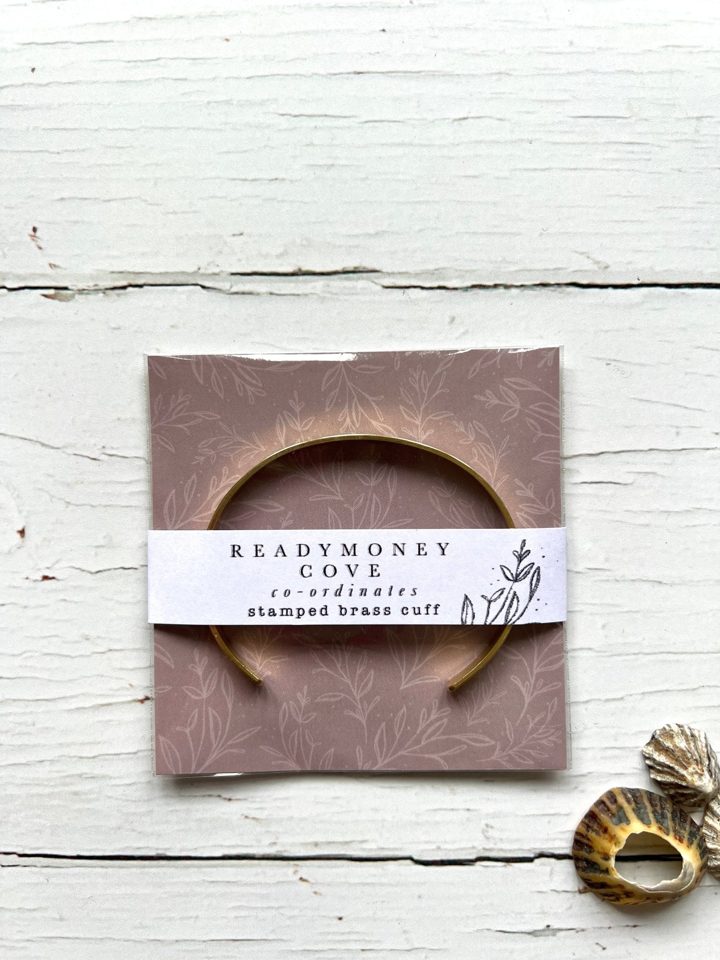 Readymoney Cove coordinates brass cuff, packaged stamped bracelet, personalized Cornwall location jewelry, coastal gift