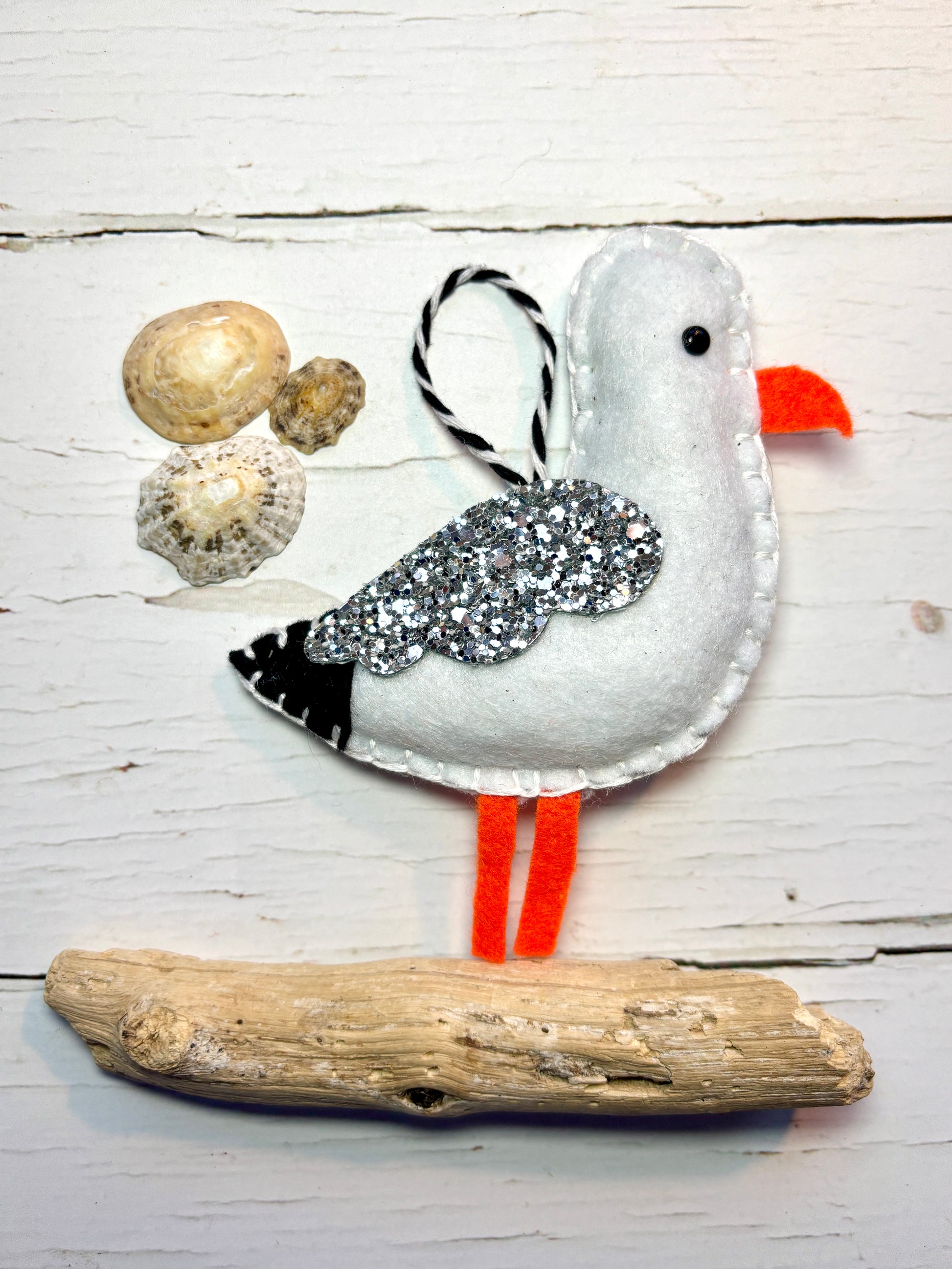 Christmas bird handmade felt seagull ornament with glitter wing on driftwood, nautical coastal decor, Cornish seaside craft
