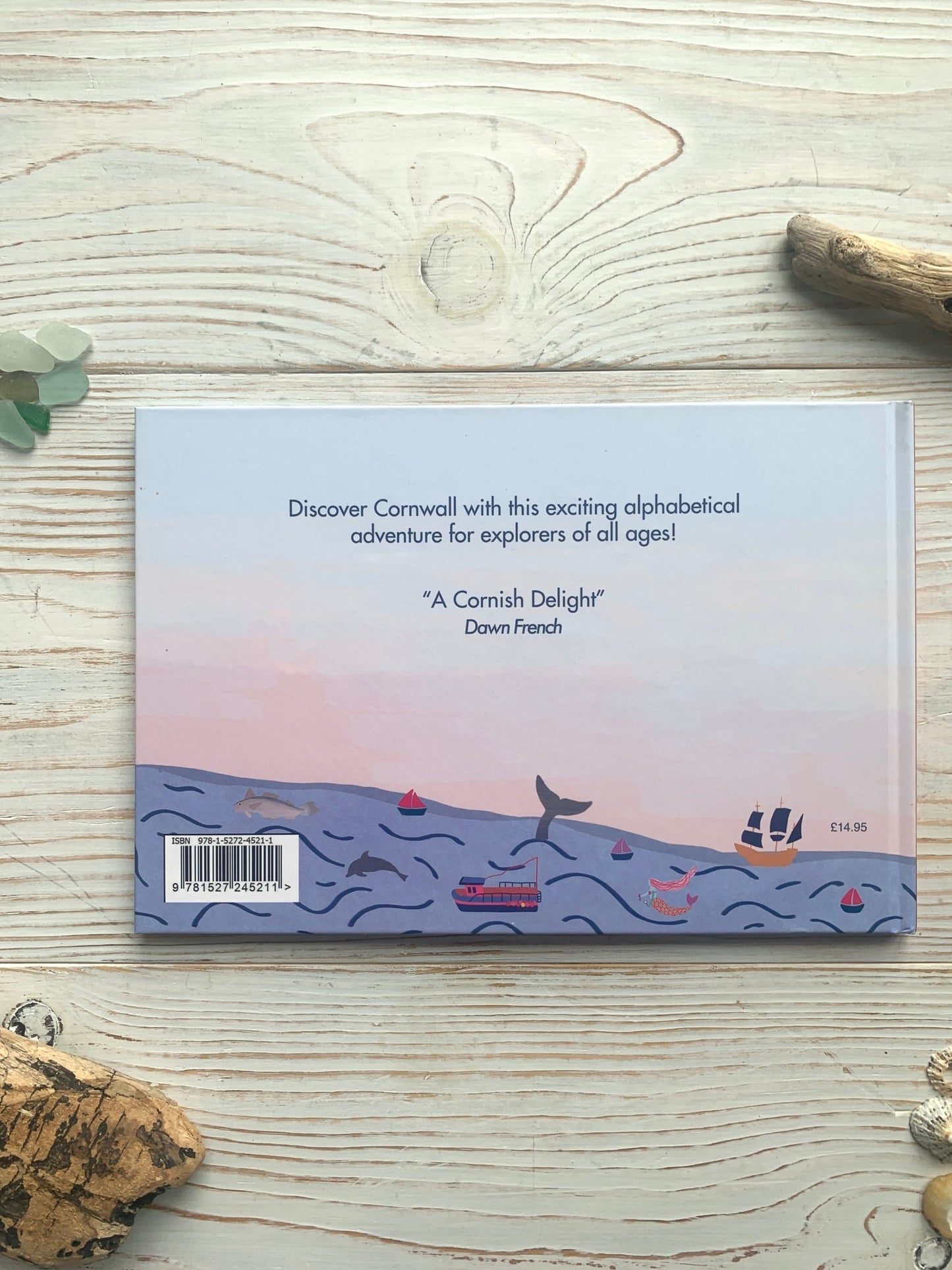 back cover of Cornwall Alphabetical Adventure book Dawn French quote, illustrated sea life, ISBN. Kids' Cornish gift book