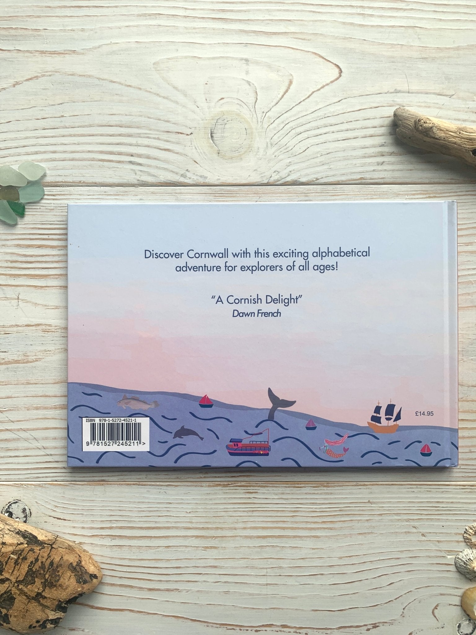 back cover of Cornwall Alphabetical Adventure book Dawn French quote, illustrated sea life, ISBN. Kids' Cornish gift book