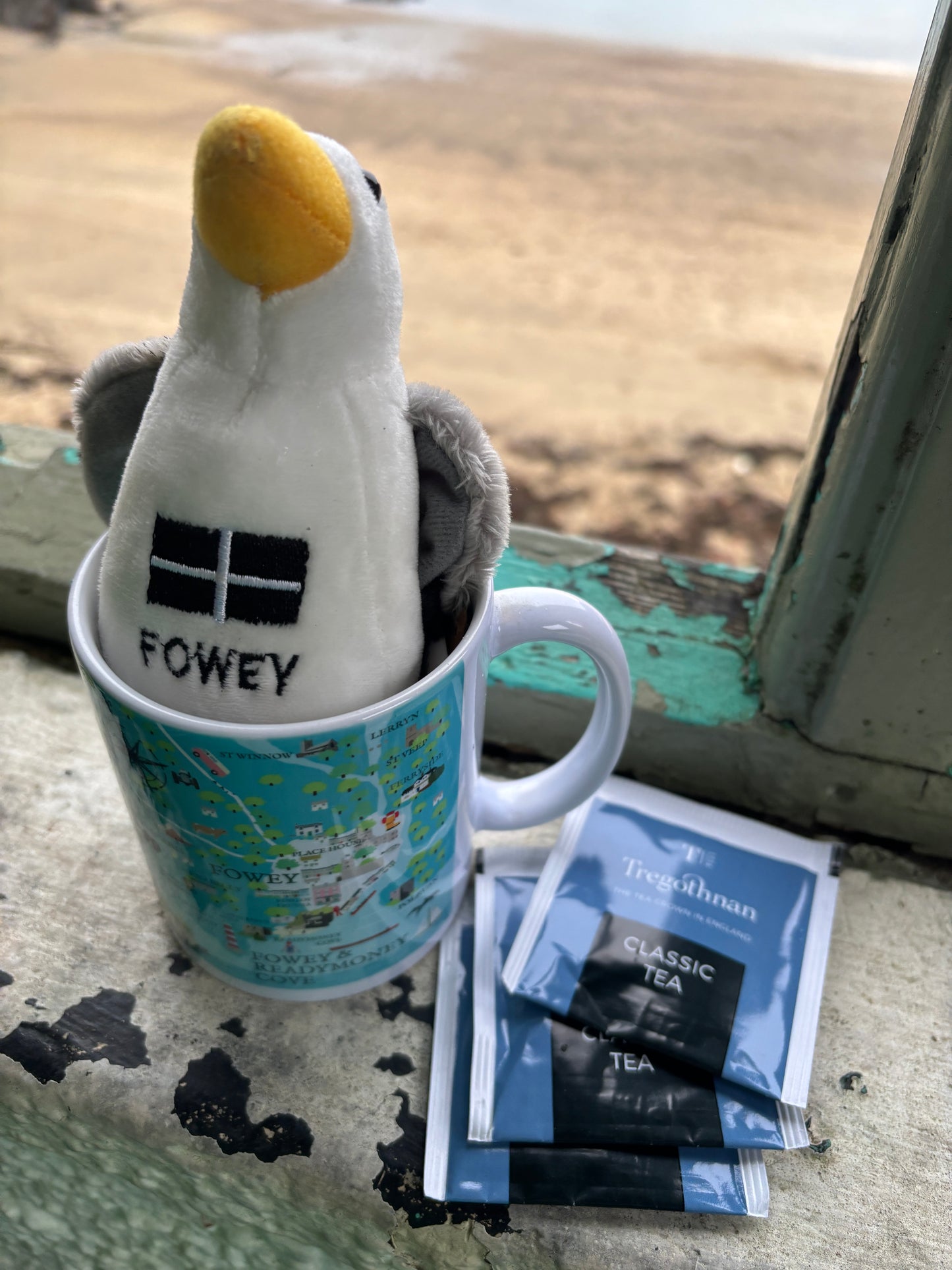 Fowey mug and penguin soft toy with Cornish flag Tregothnan tea sachets coastal Christmas gift or holiday souvenir set