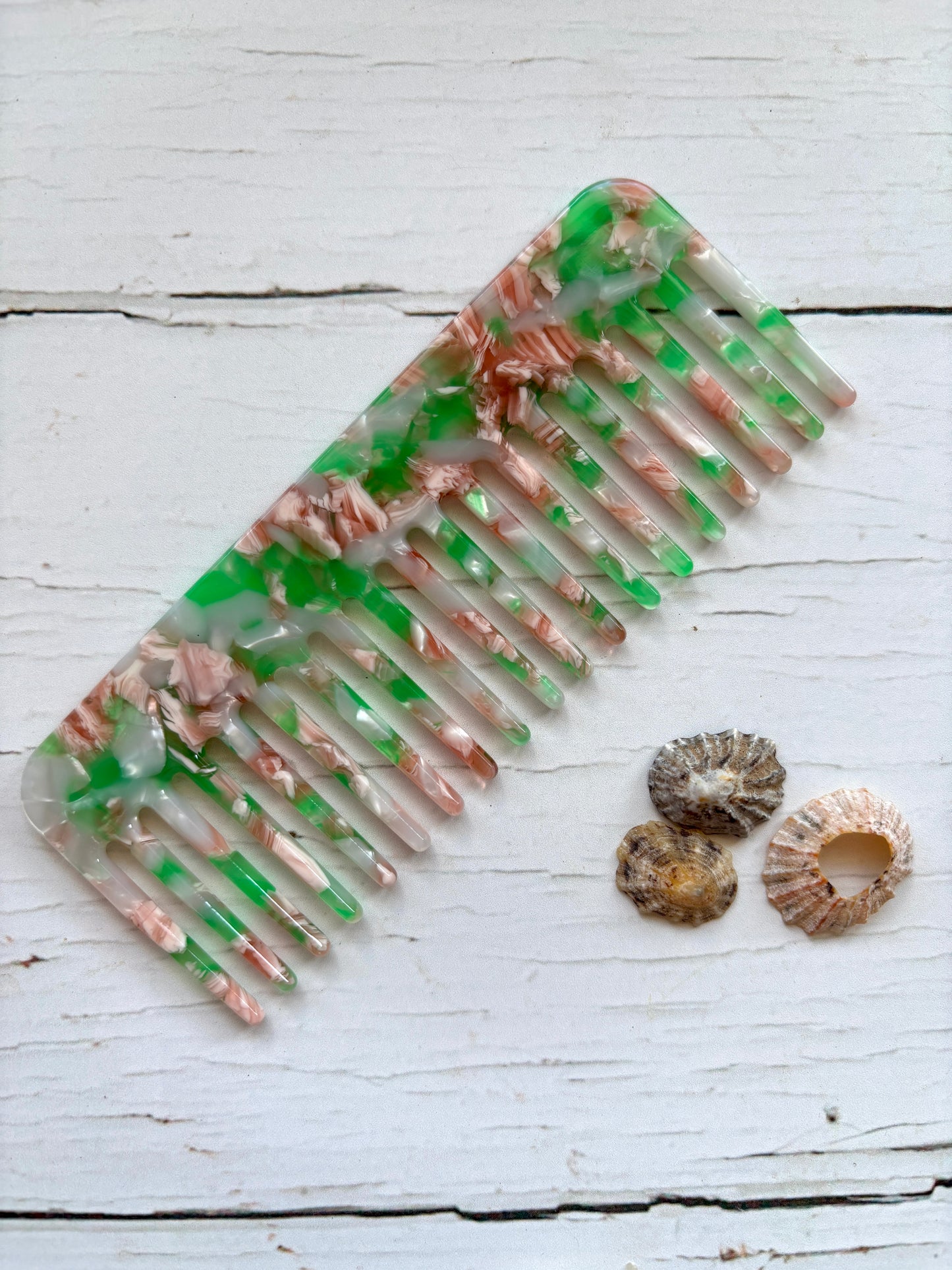 eco resin pocket comb – translucent green-pink marble detangler with wide teeth, sustainable and travel-friendly