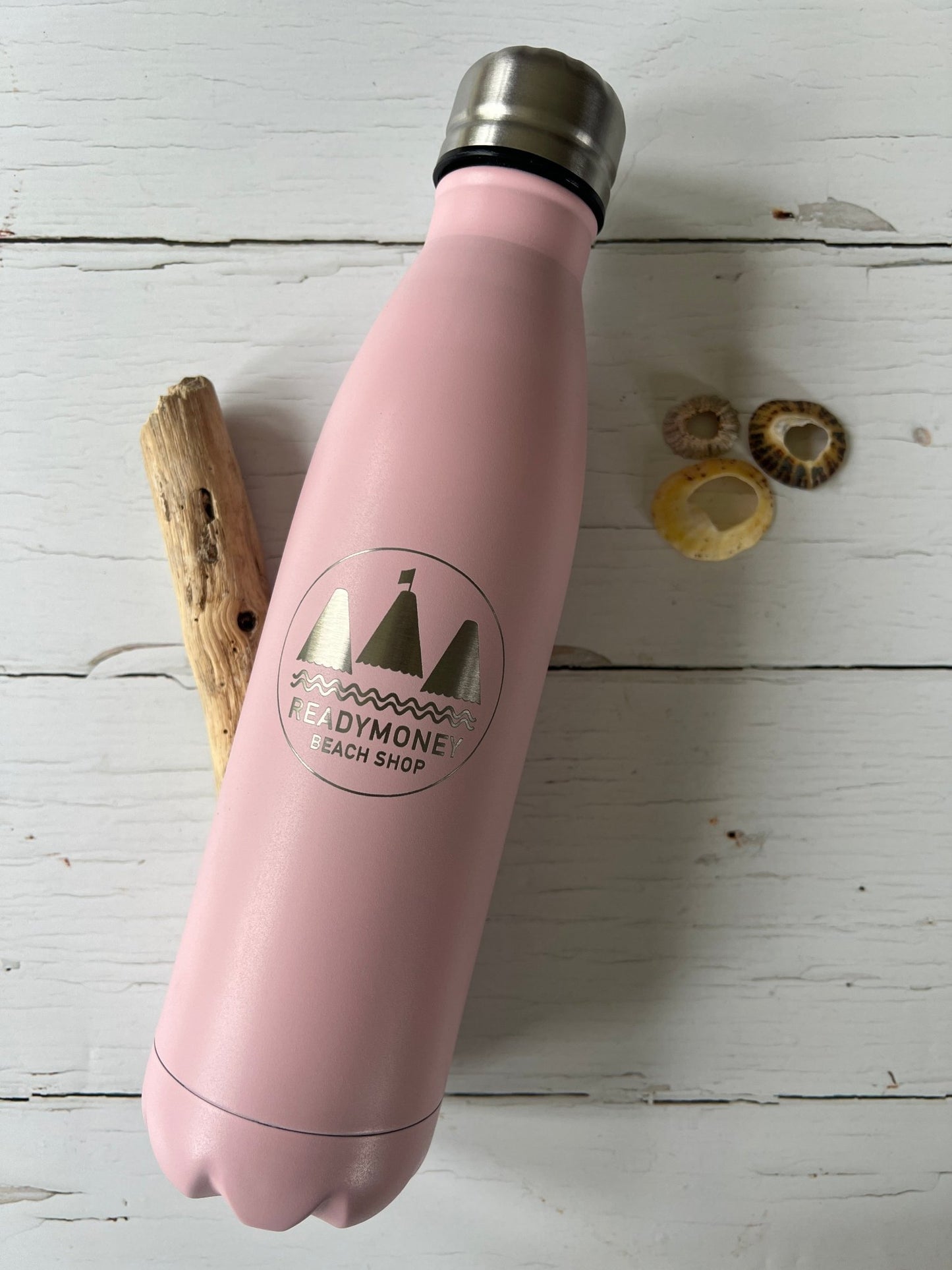 pastel pink insulated water bottle with etched Readymoney beach shop logo - eco-friendly reusable drinkware