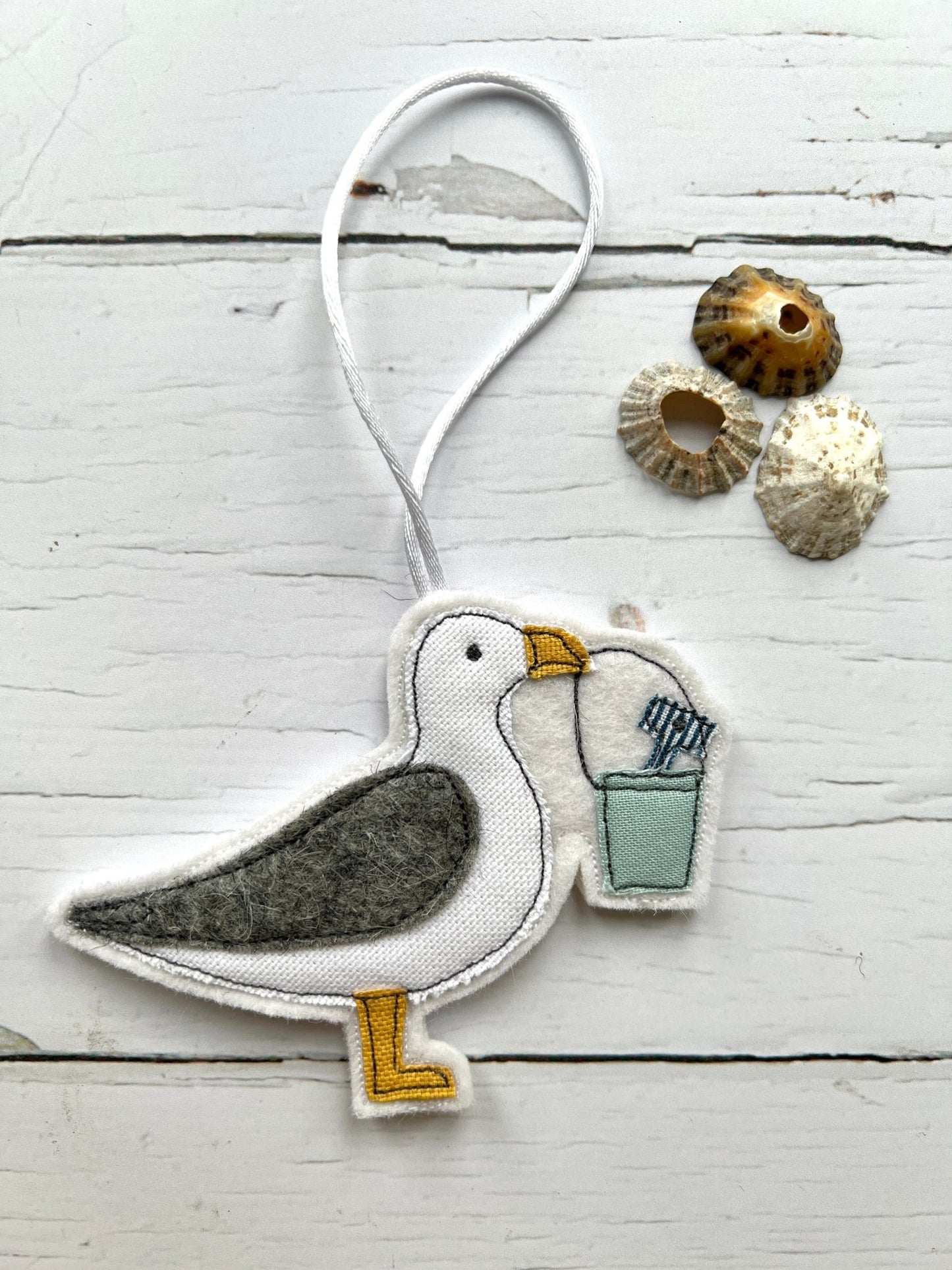 embroidered seagull ornament with bucket, coastal bird decoration, handmade beach charm, nautical fabric hanging, seaside decor