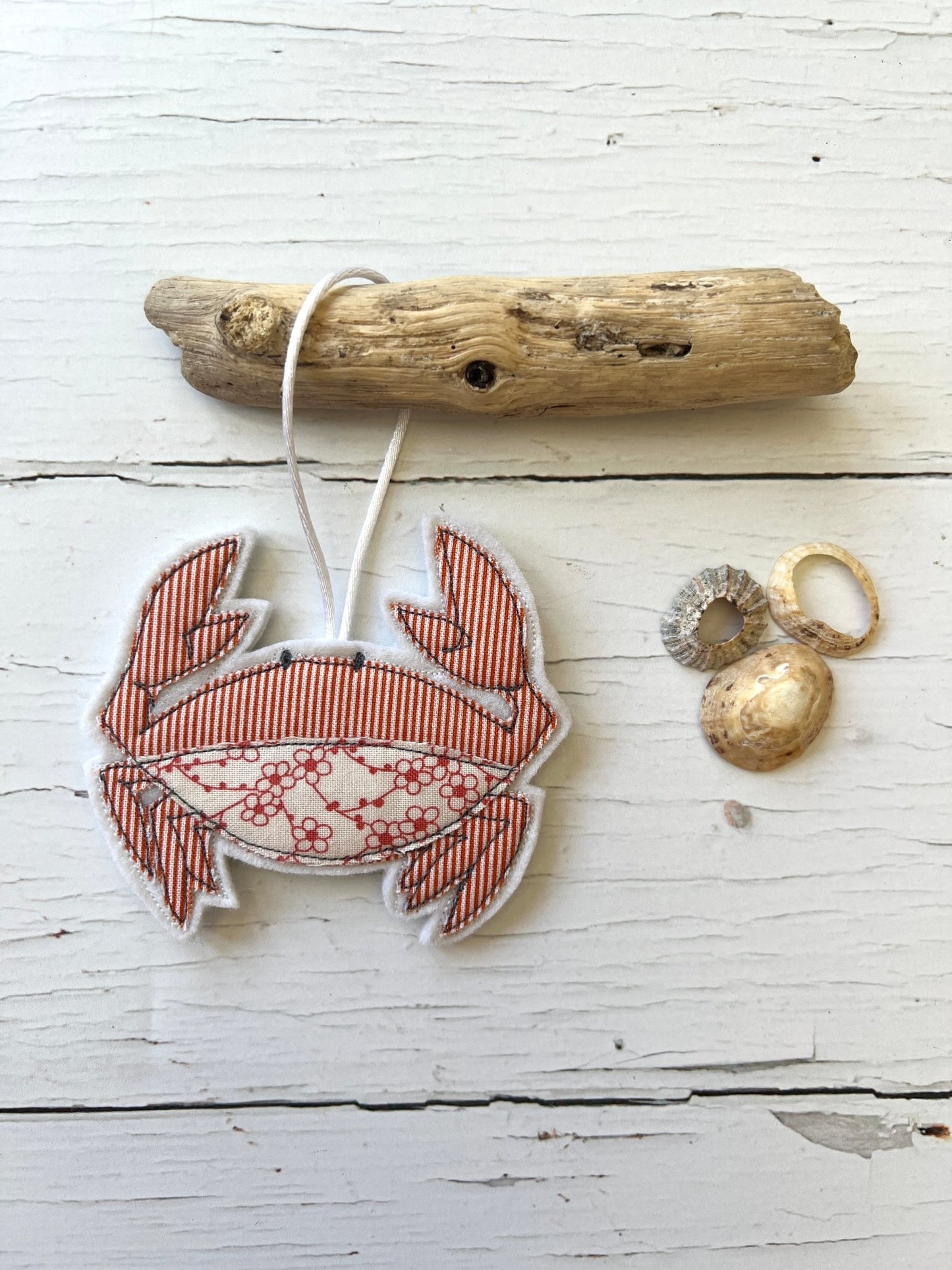 quilted crab decoration, red striped marine ornament, seaside fabric charm, handcrafted ocean decor, driftwood display gift