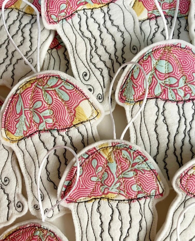 quilted jellyfish decorations, stitched marine life ornaments, pink floral fabric sea animals, handcrafted ocean nursery decor