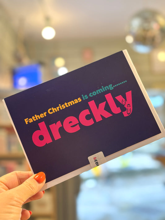 dreckly Father Christmas card, humorous Cornish saying holiday greeting, navy blue with bold pink text design