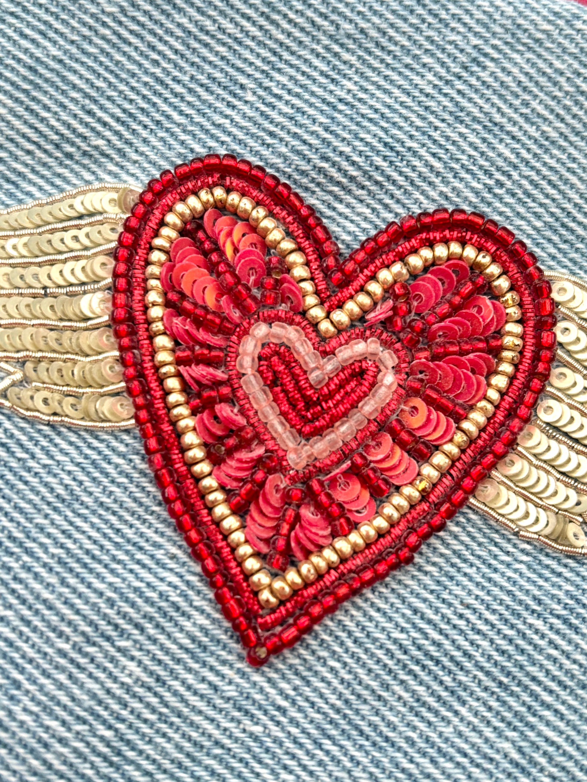 flying heart beaded sequin denim zipped pouch detail