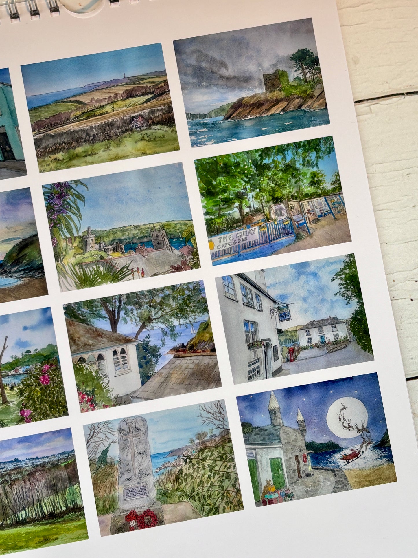 Fowey calendar detail watercolors, Cornwall landmark paintings closeup, castle beach town scenes, Sue Eng art calendar