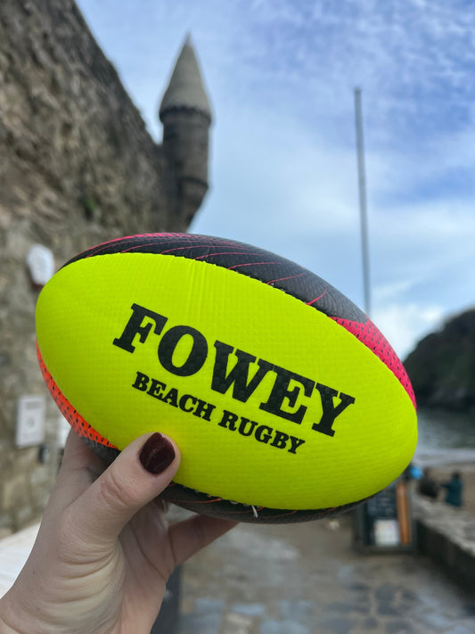 Fowey beach rugby ball outdoor sports equipment in neon yellow with black "FOWEY BEACH RUGBY" text water-resistant souvenir toy