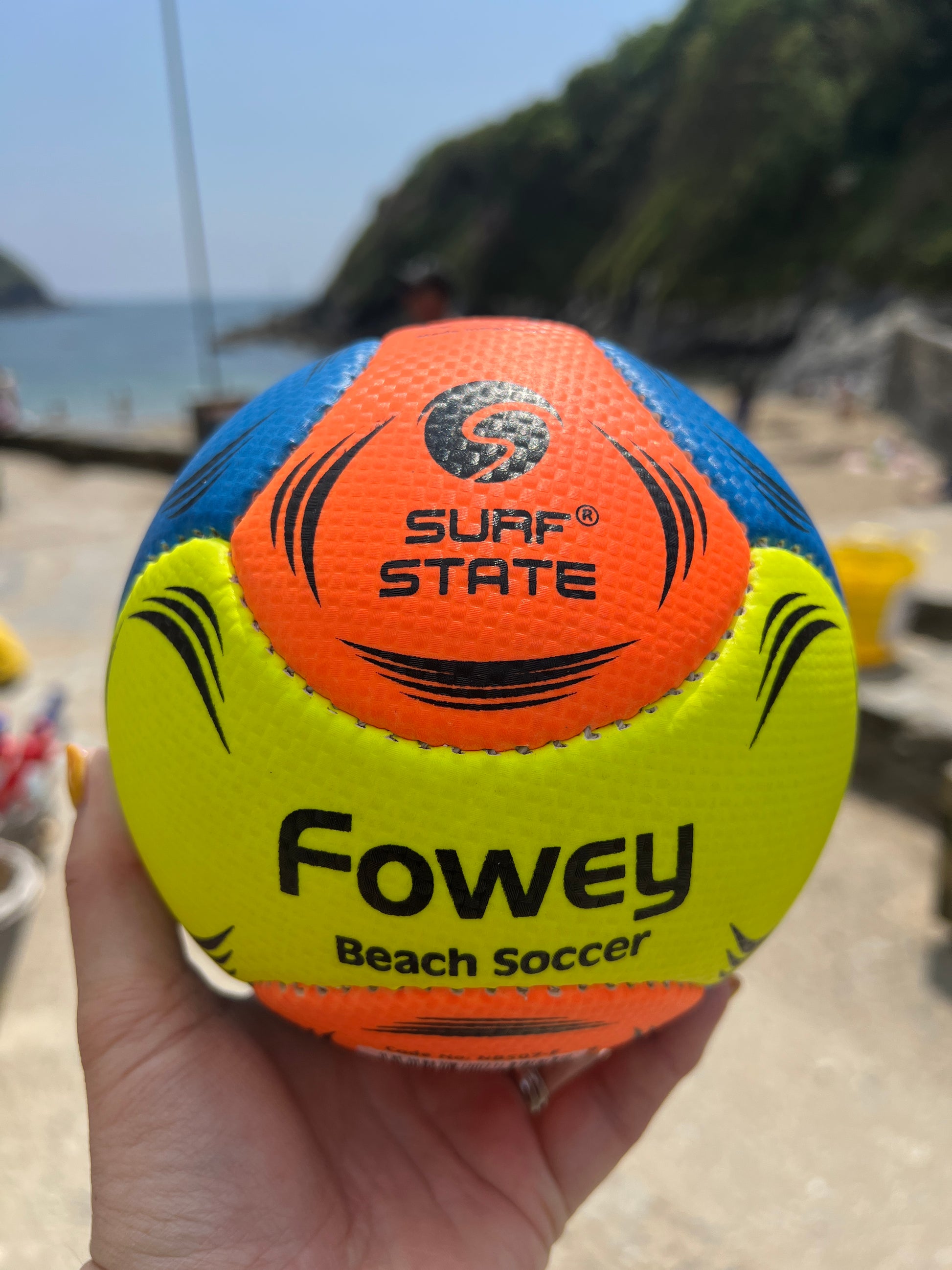 Fowey beach football bright orange, blue, and yellow surf state ball durable waterproof beach soccer for outdoor fun and Cornwall souvenir