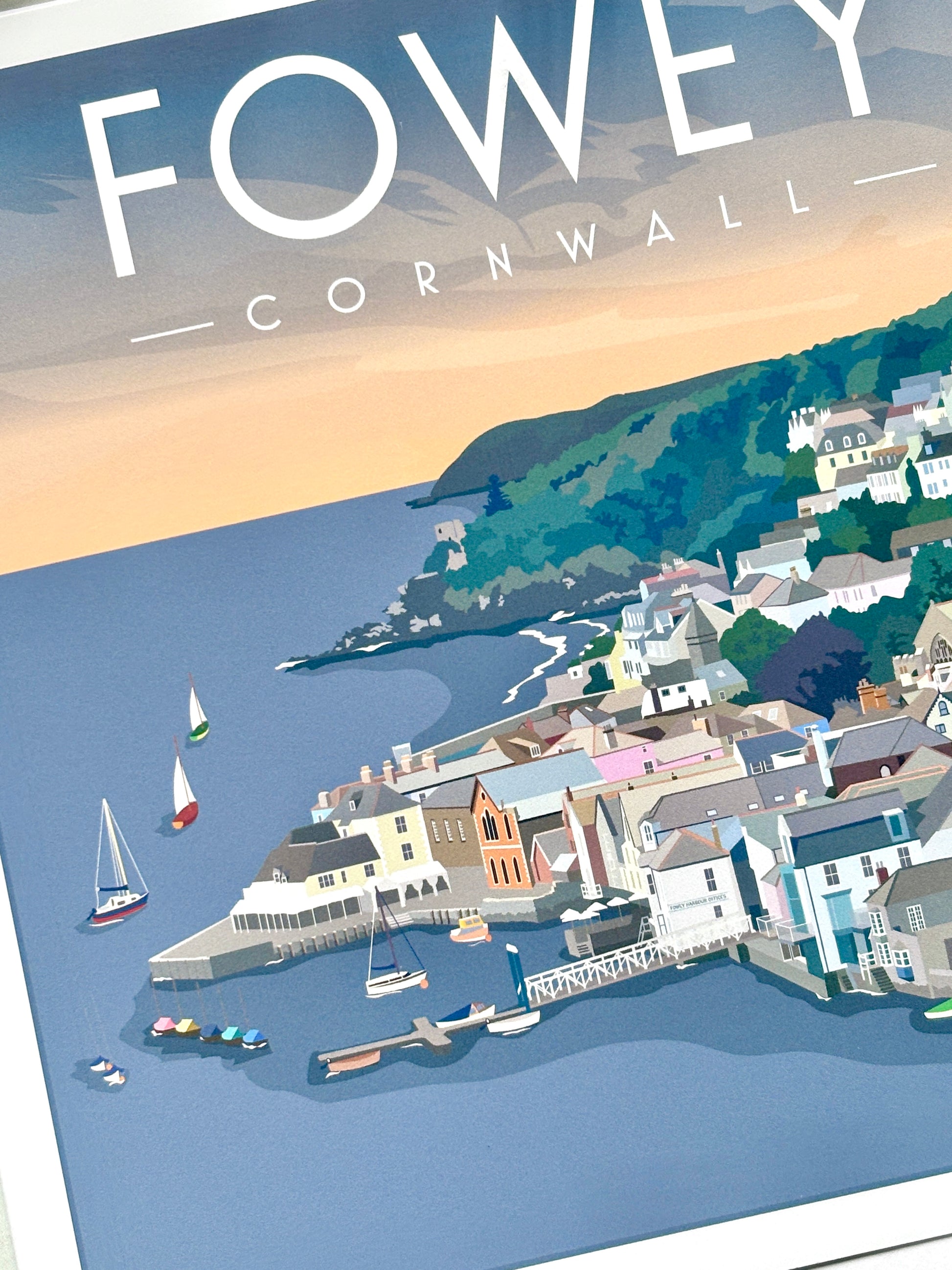 Closeup shot of fowey Cornwall art print showing coastal town, boats, and sunset, seaside illustration postcard by Jennifer Cooper Designs