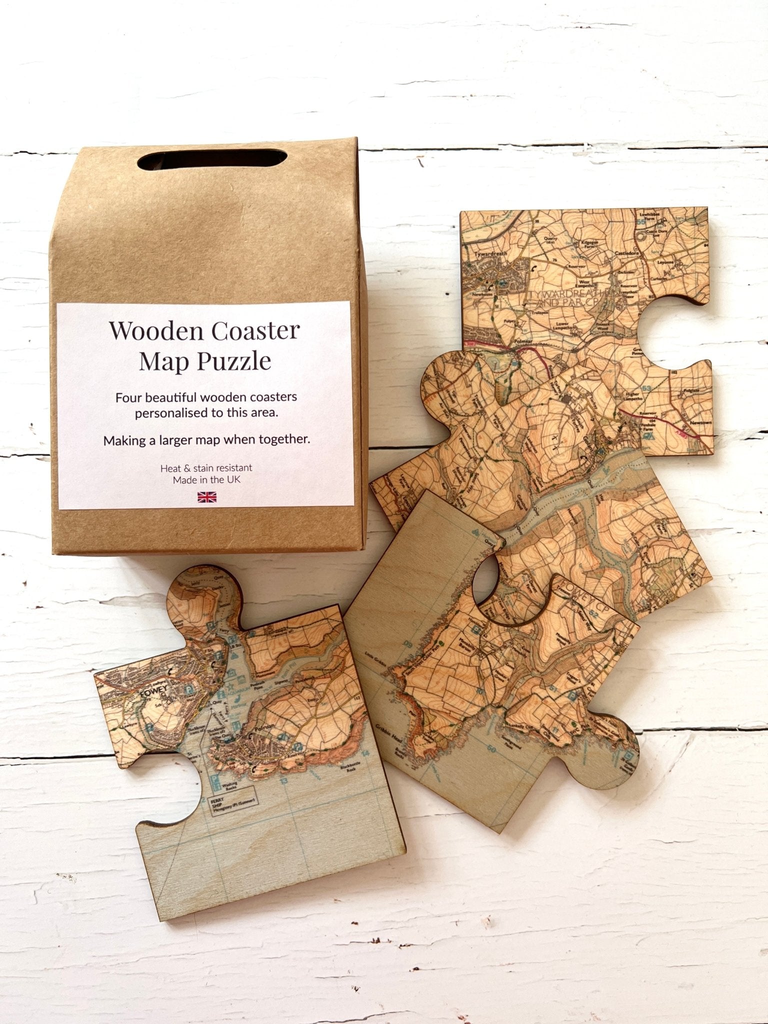 Fowey map puzzle coaster set four wooden, jigsaw-shaped coasters with a map print, packaged in a kraft box UK-made Cornwall souvenir