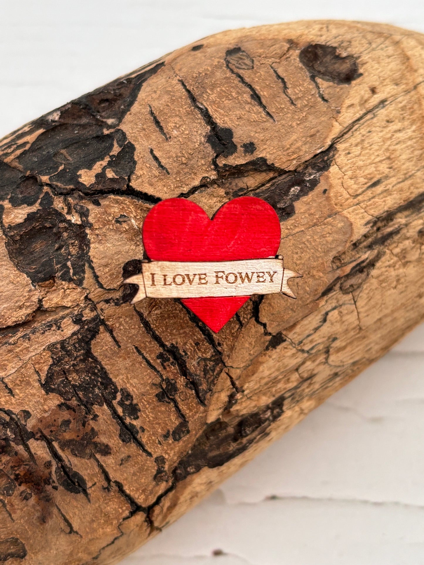 red heart-shaped wooden pin badge with “LOVE FOWEY” engraving—handcrafted coastal gift, eco-friendly and sentimental