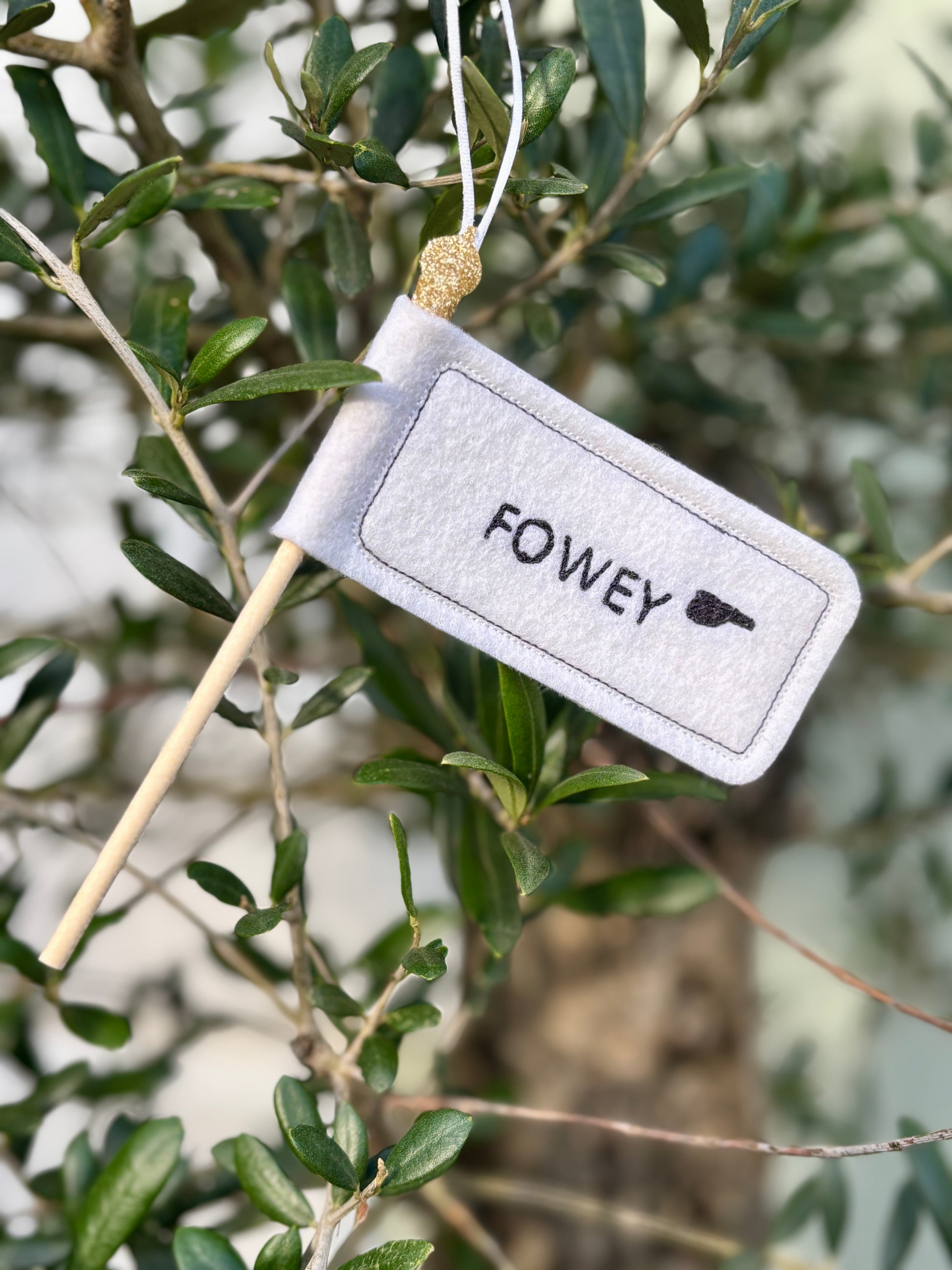 handmade 'Fowey' signpost ornament felt banner decor on a wooden stick with gold glitter hanger Cornish coastal souvenir